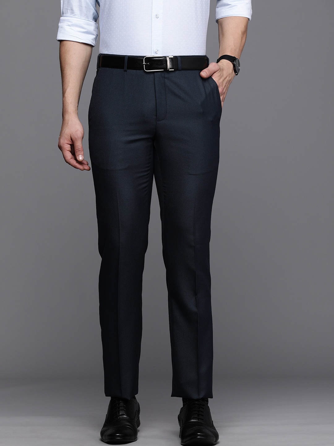 

Raymond Men Navy Blue Solid Slim Fit Mid-Rise Formal Trousers