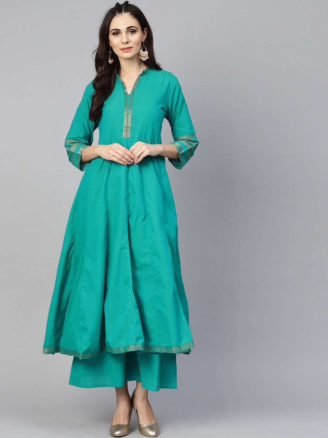 

Bhama Couture Women Green Panelled Kurta with Palazzos