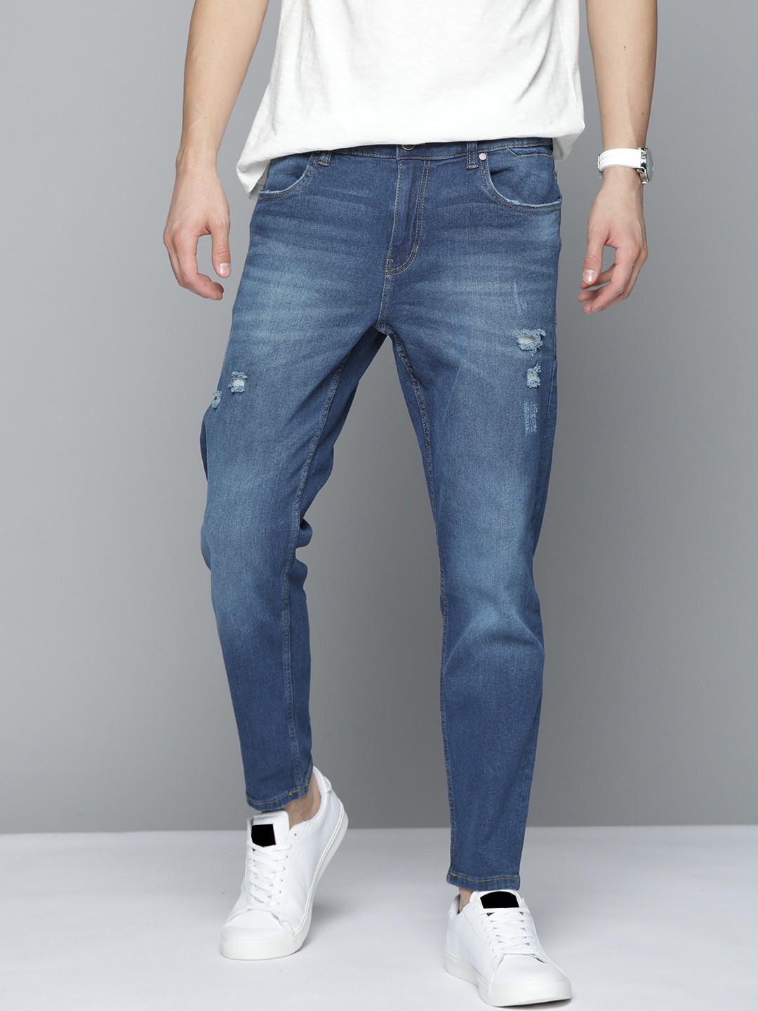 

Mast & Harbour Men Navy Blue Carrot Fit Mild Distress Light Fade Stretchable Jeans