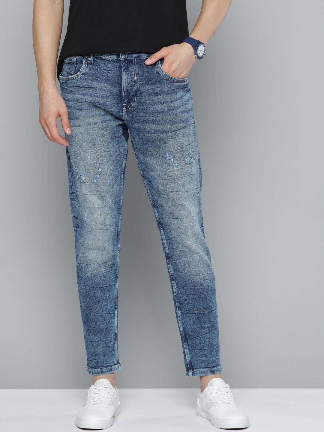 

Mast & Harbour Men Blue Carrot Fit Light Fade Stretchable Jeans