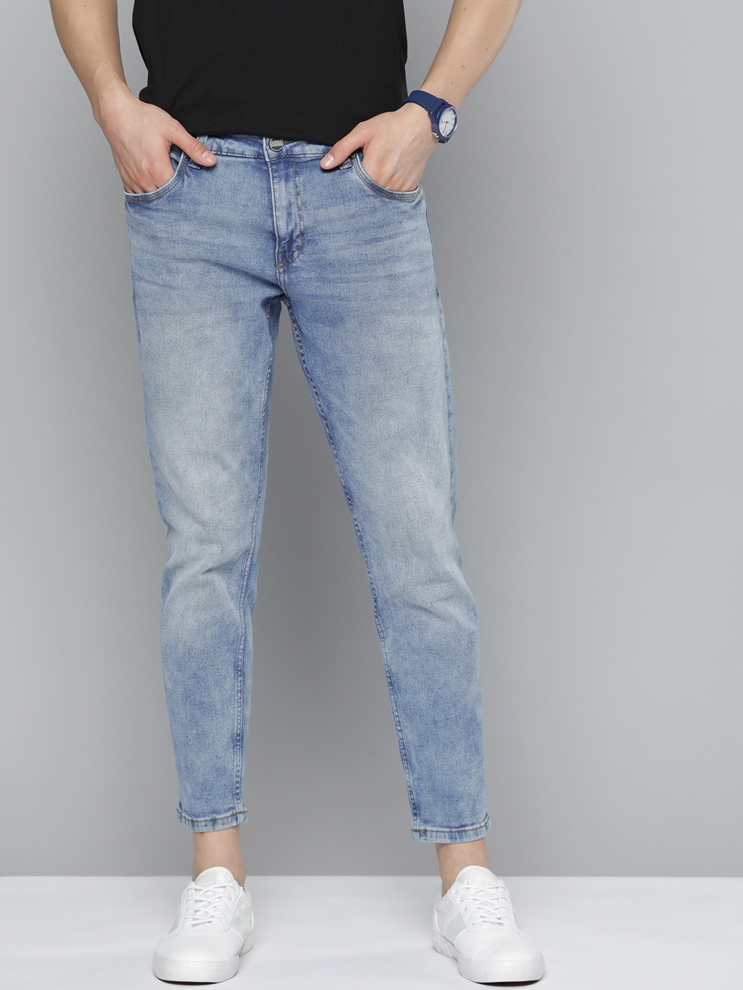 

Mast & Harbour Men Blue Carrot Fit Heavy Fade Stretchable Jeans