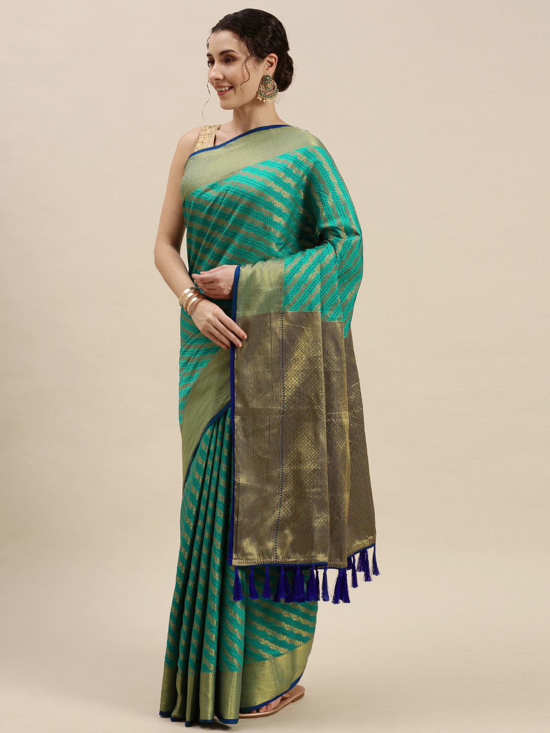 

Mitera Blue & Golden Ethnic Motifs Silk Blend Saree