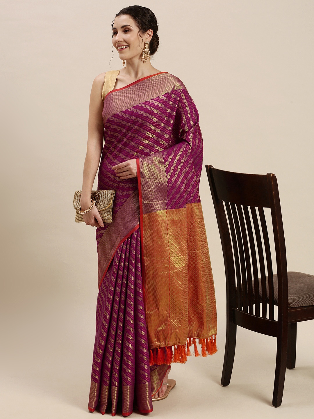 

Mitera Purple & Golden Ethnic Motifs Silk Blend Saree