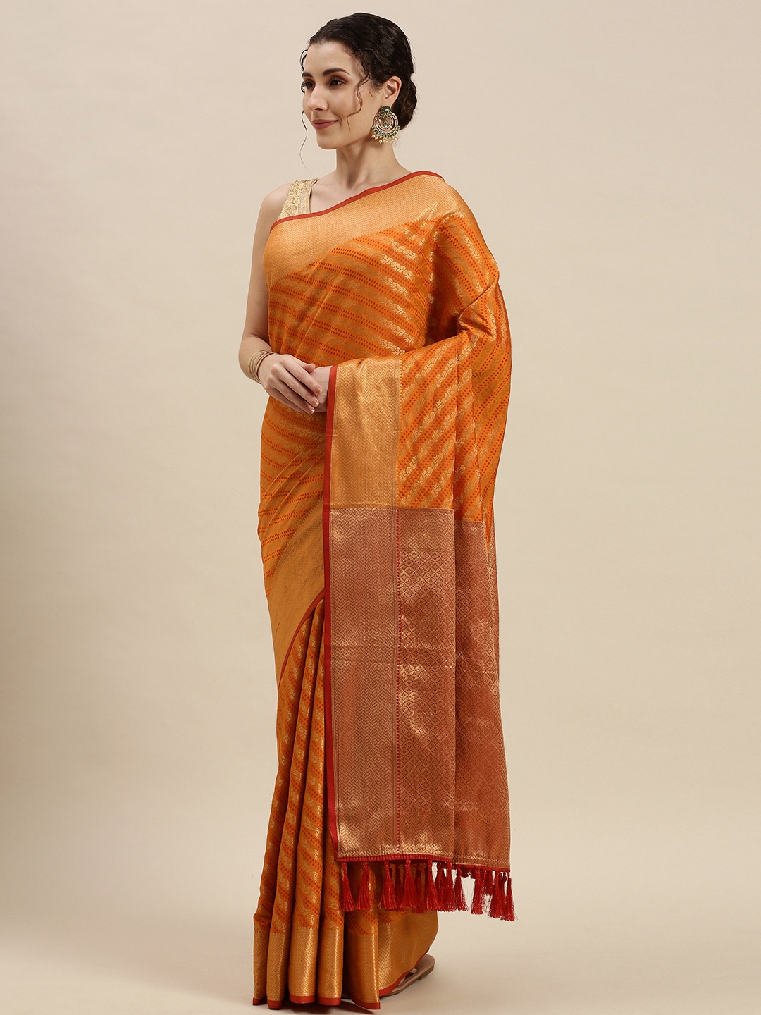 

Mitera Orange & Golden Woven Design Silk Blend Saree
