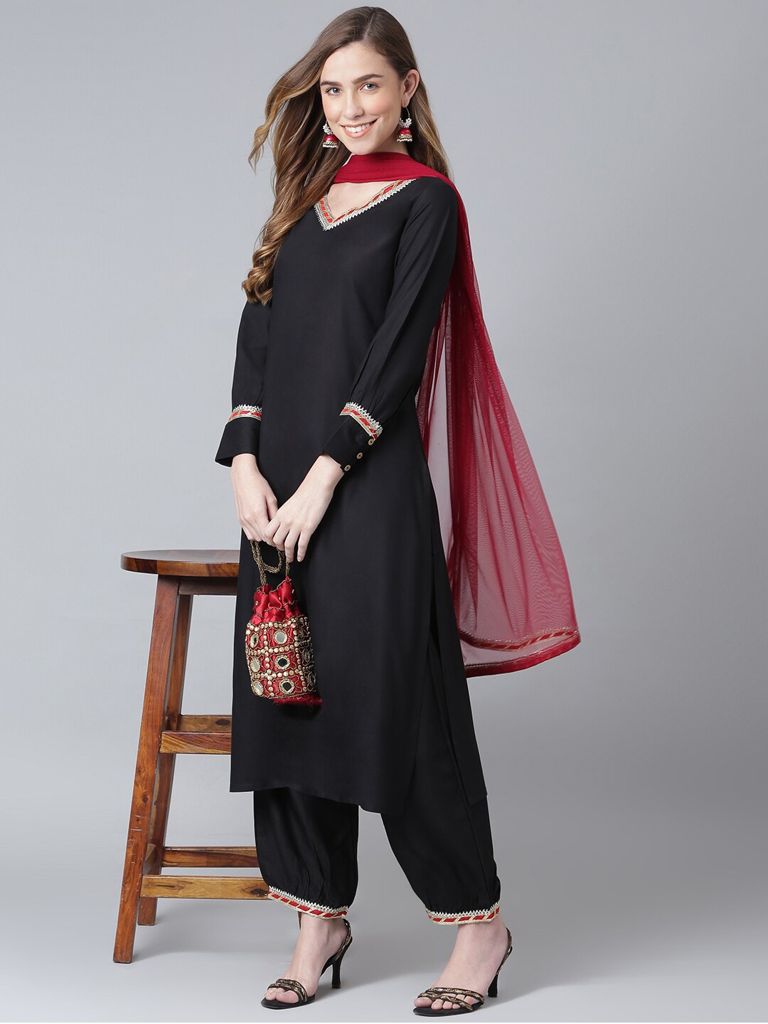 

Khushal K Women Black Yoke Design Gotta Patti Kurta with Trousers & With Dupatta