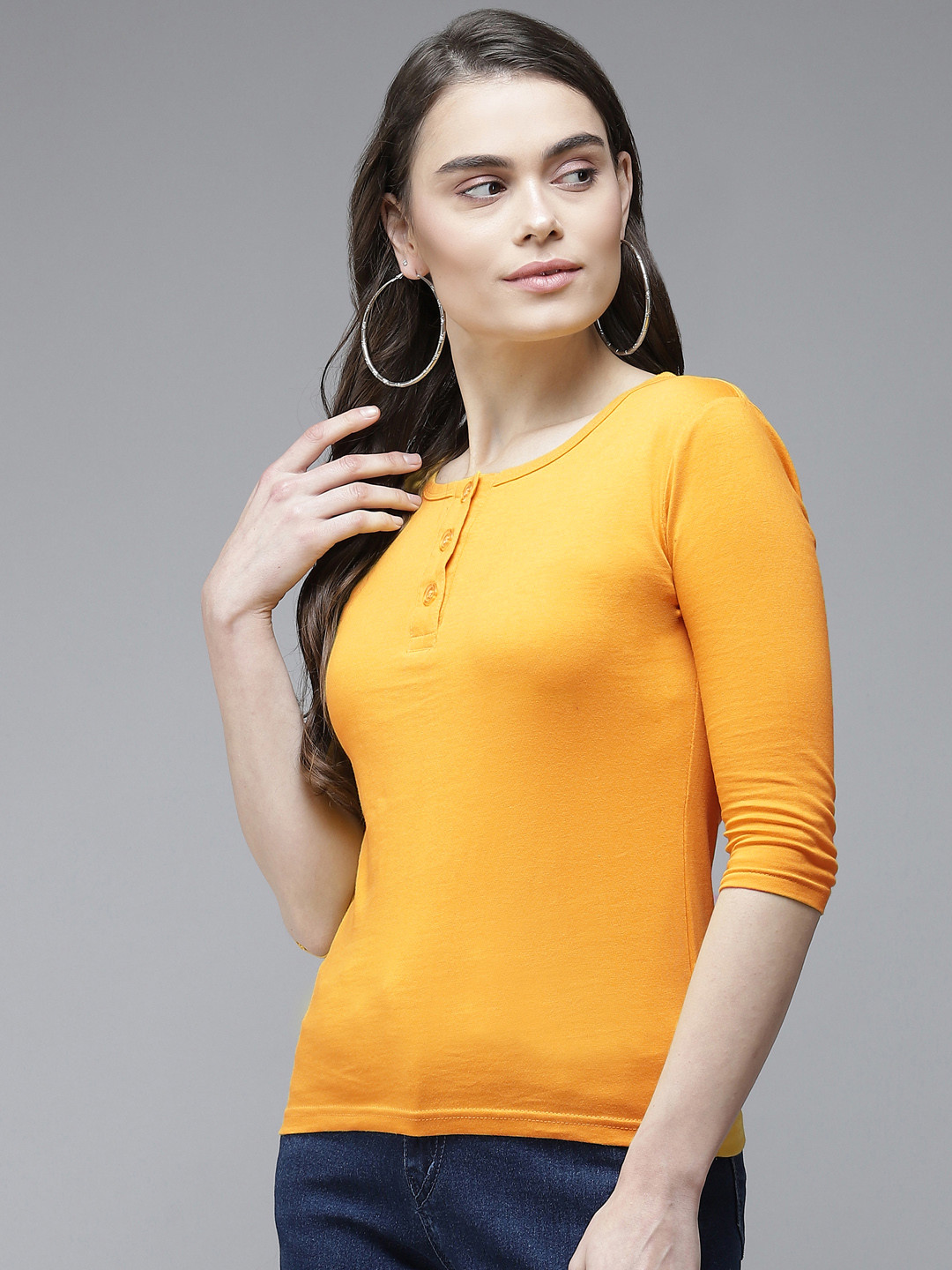 

The Dry State Women Yellow Solid Henley Neck Slim Fit T-shirt