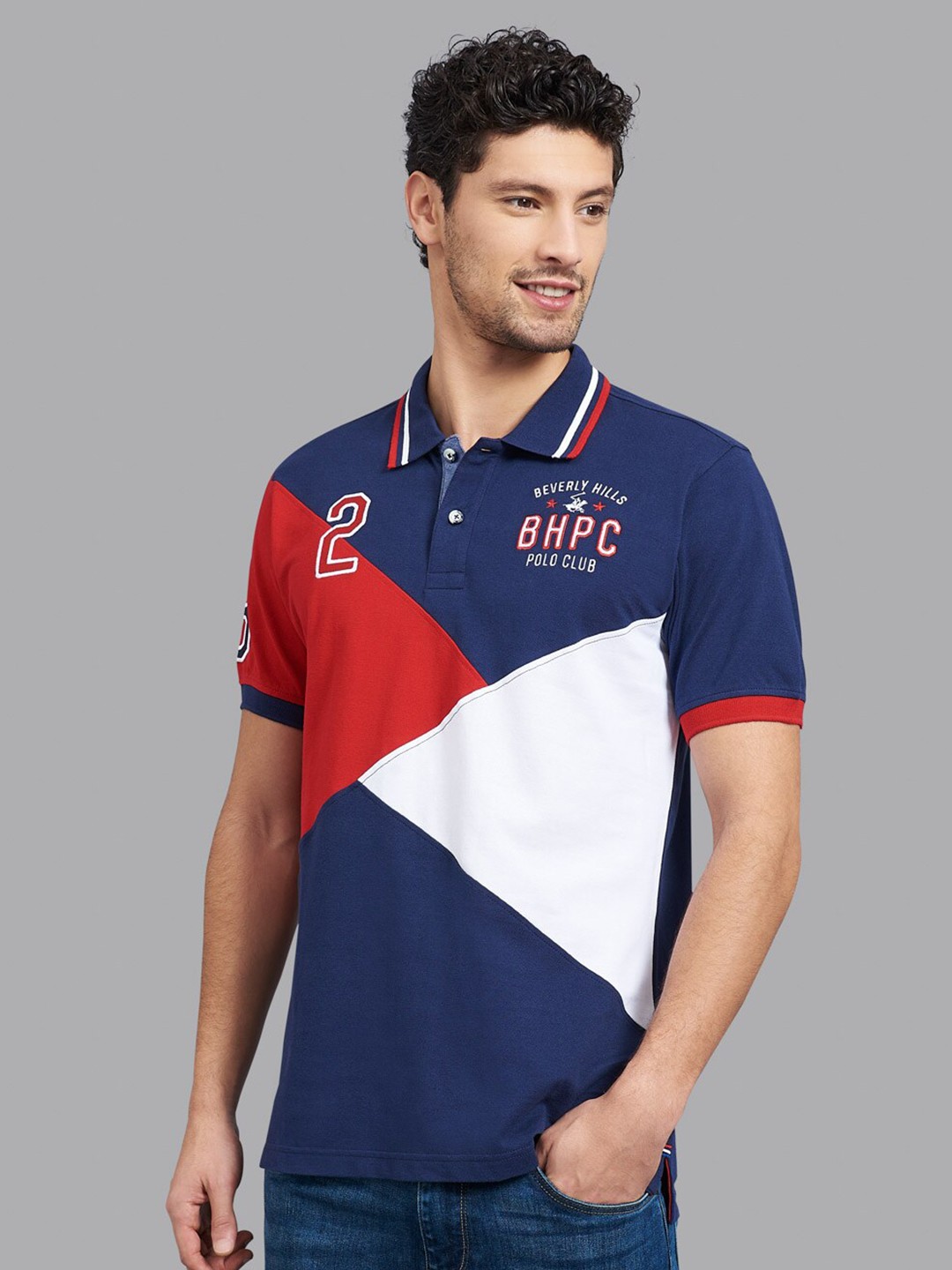

Beverly Hills Polo Club Men Navy Blue & Red Colourblocked Polo Collar T-shirt