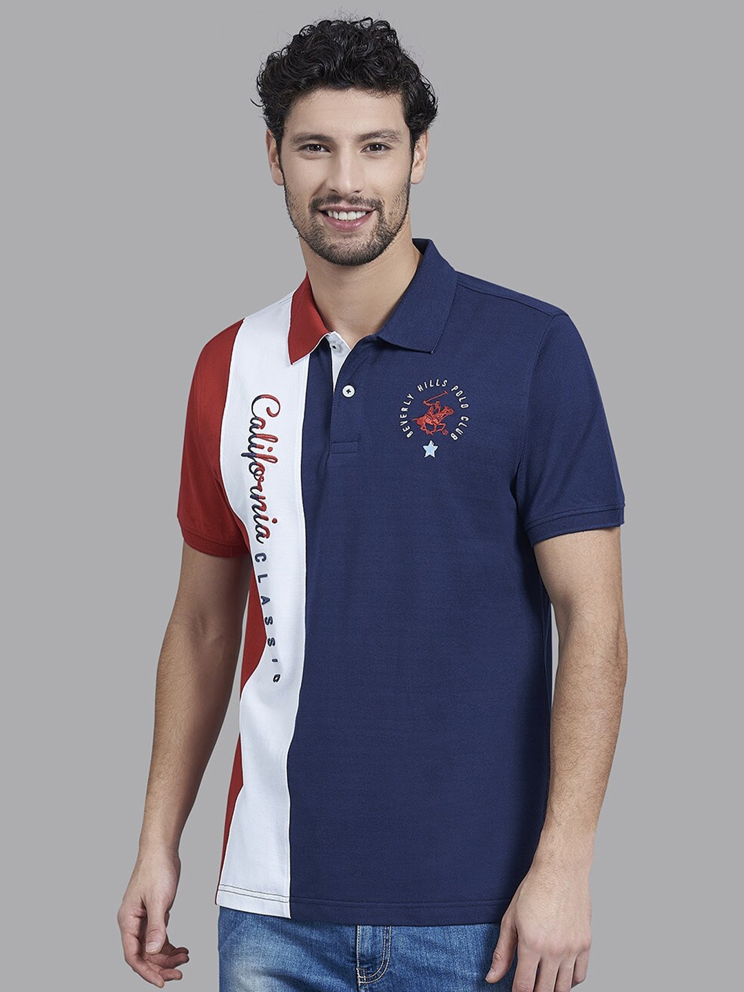 

Beverly Hills Polo Club Men Navy Blue & White Colourblocked Cotton Polo Collar T-shirt