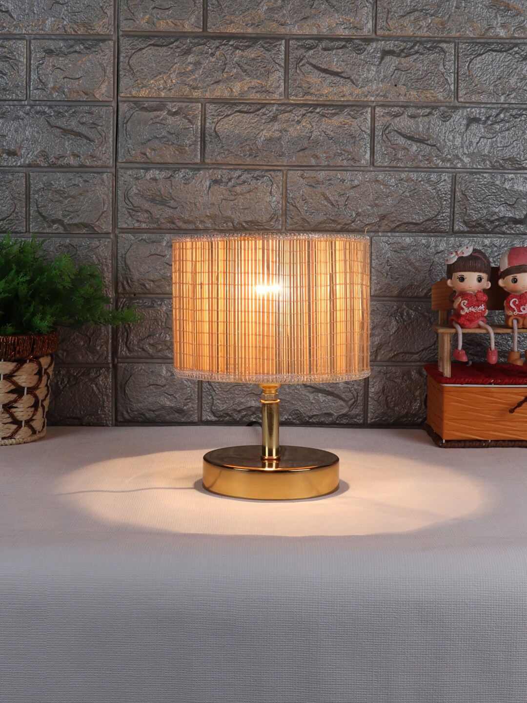 

Devansh Beige & Gold-Toned Metal Table Lamp with Bamboo Shade