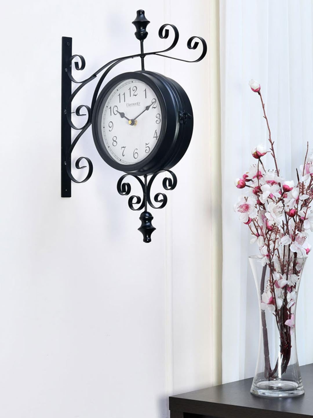 

Athome by Nilkamal Black Textured Traditional Analogue Wall Clock