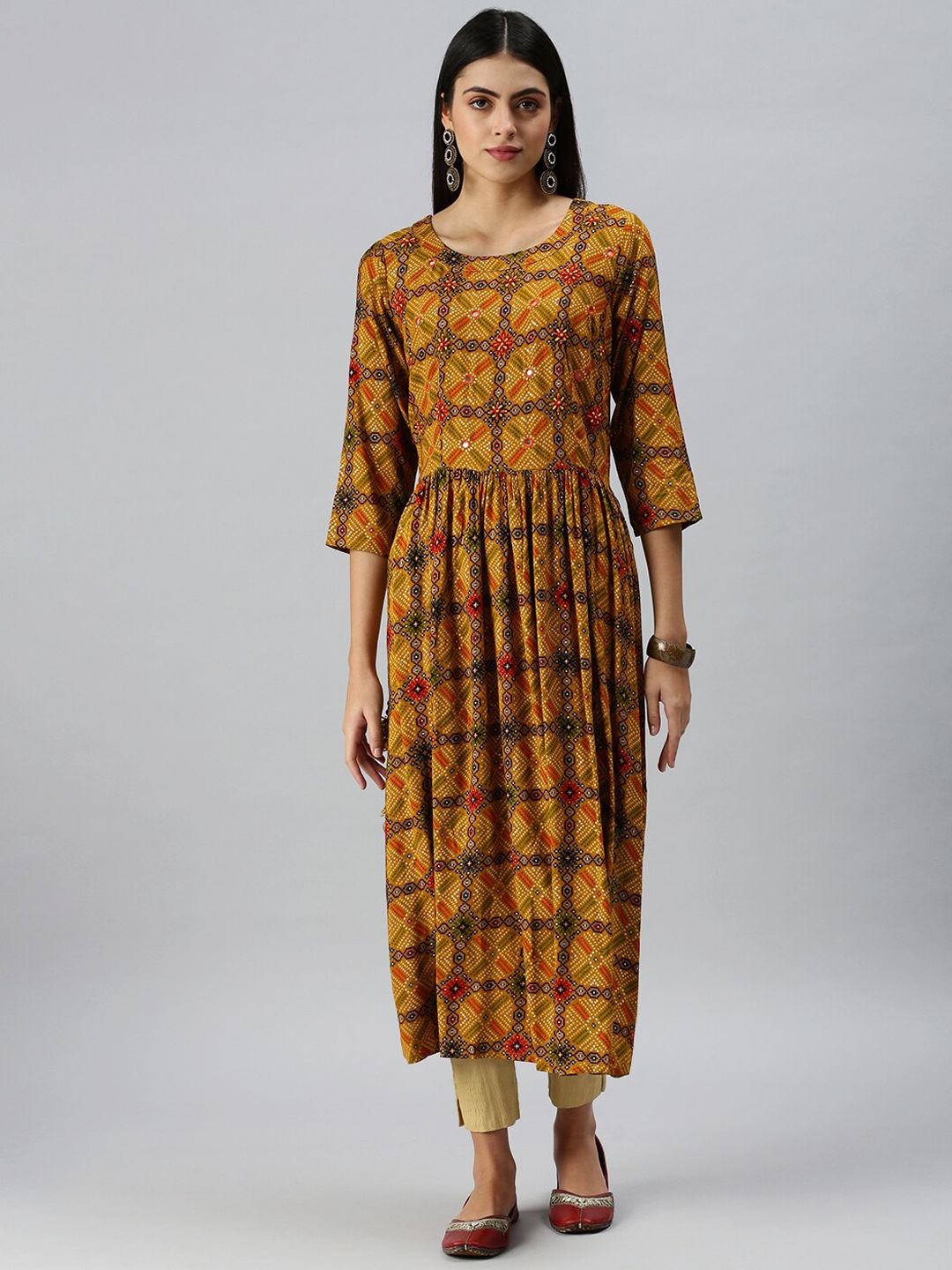 

SHOWOFF Women Yellow Ethnic Motifs Printed Thread Work Kurta