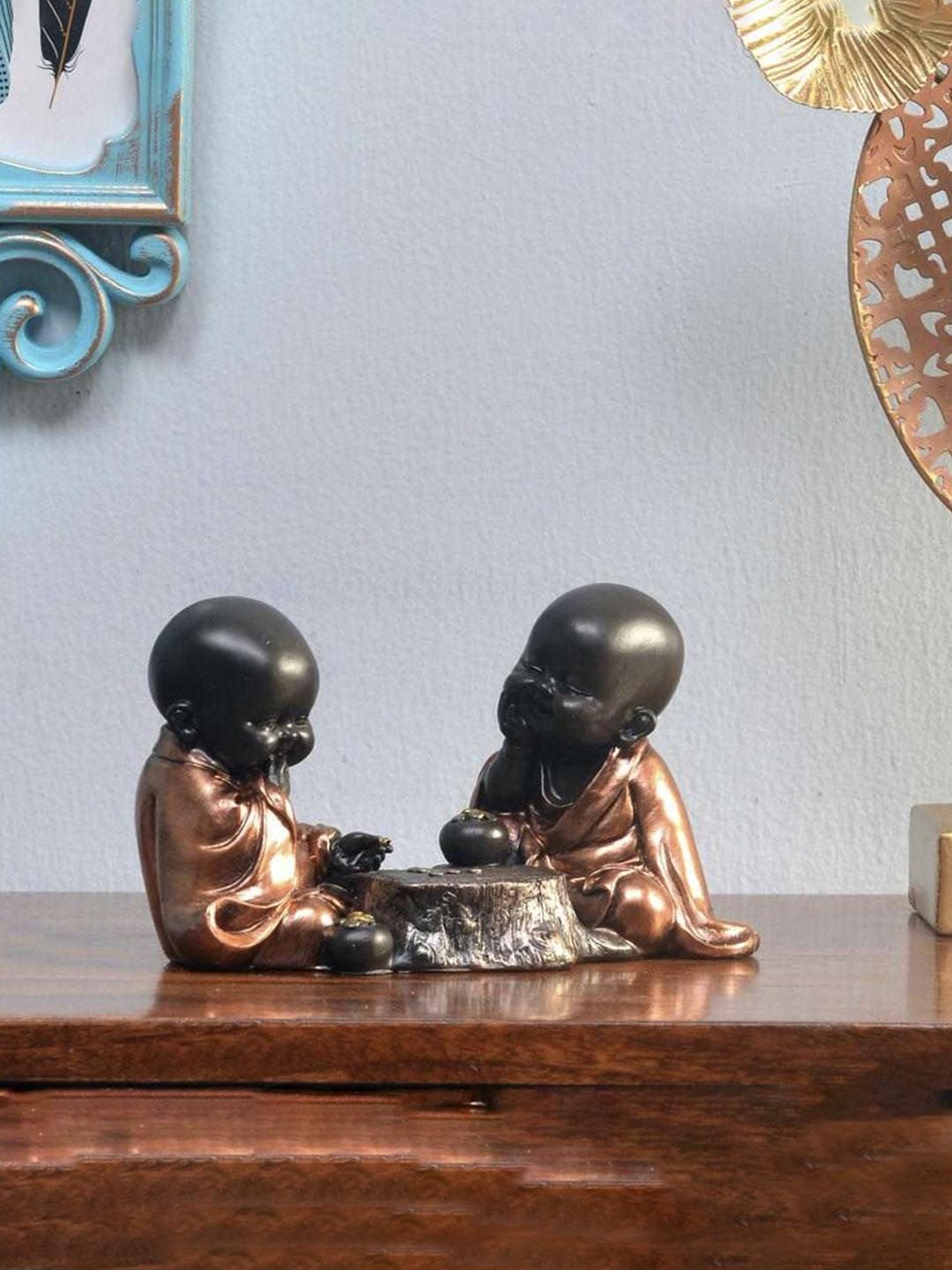 

Athome by Nilkamal Brown Baby Monks Playing Showpiece