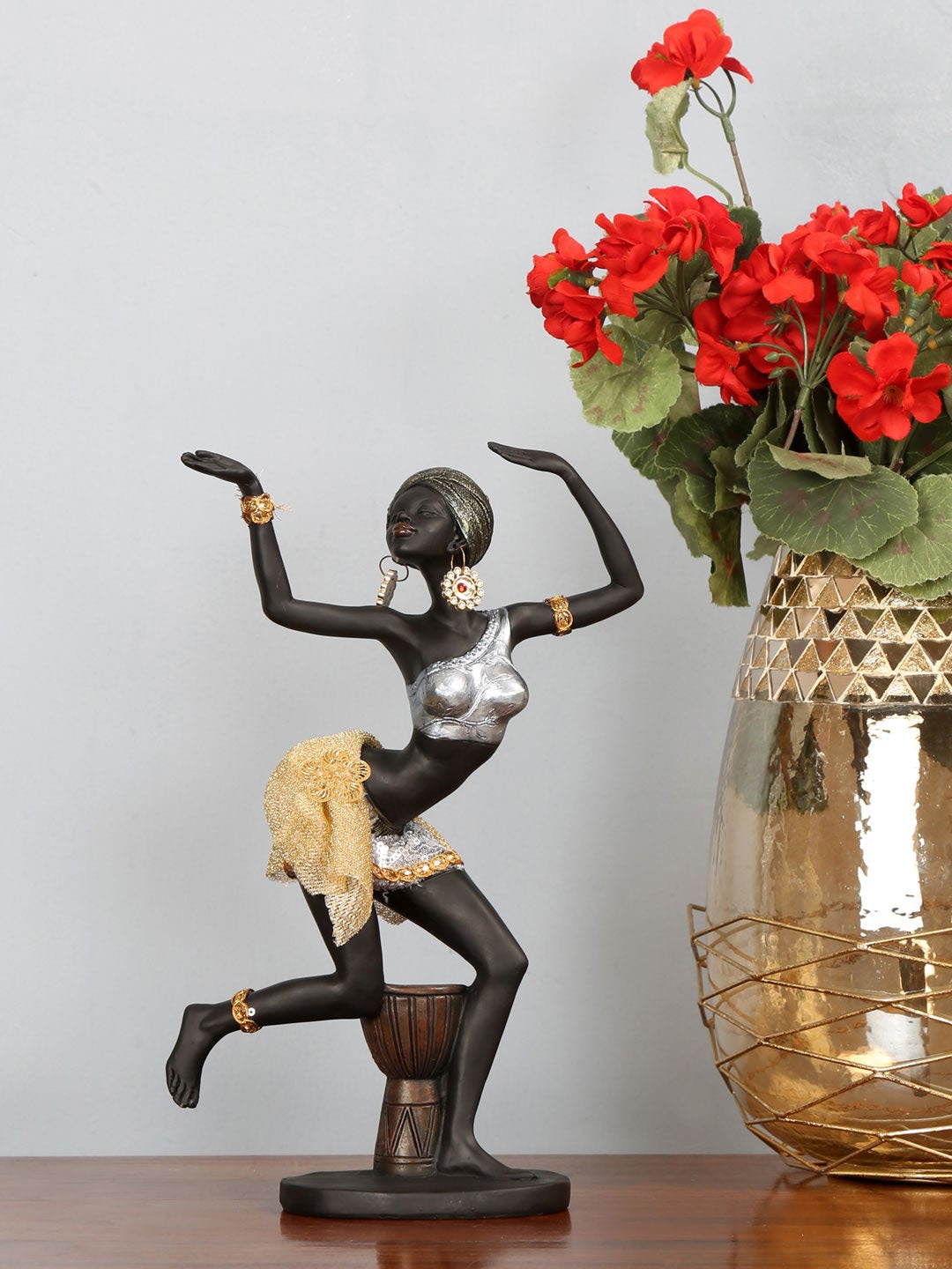 

Athome by Nilkamal Black & Gold Tribal Lady Dancing Showpiece