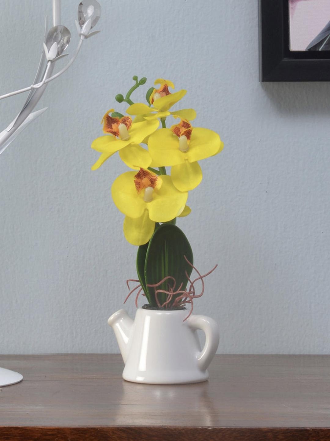 

Athome by Nilkamal Yellow & Green Artificial Orchid Flower With White Tea Pot Showpiece