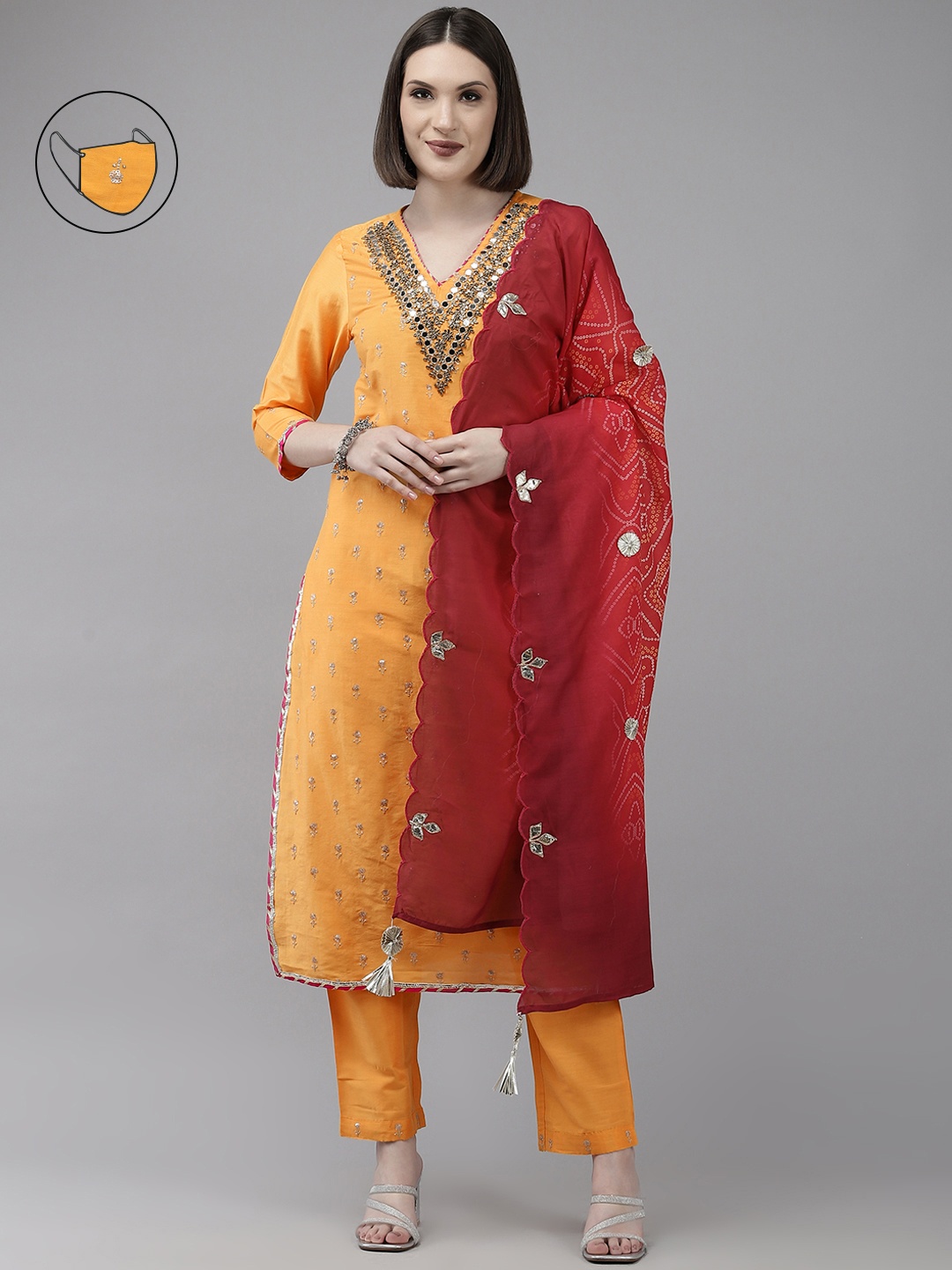 

Ishin Women Yellow Floral Embroidered Mirror Work Kurta with Trousers & With Dupatta