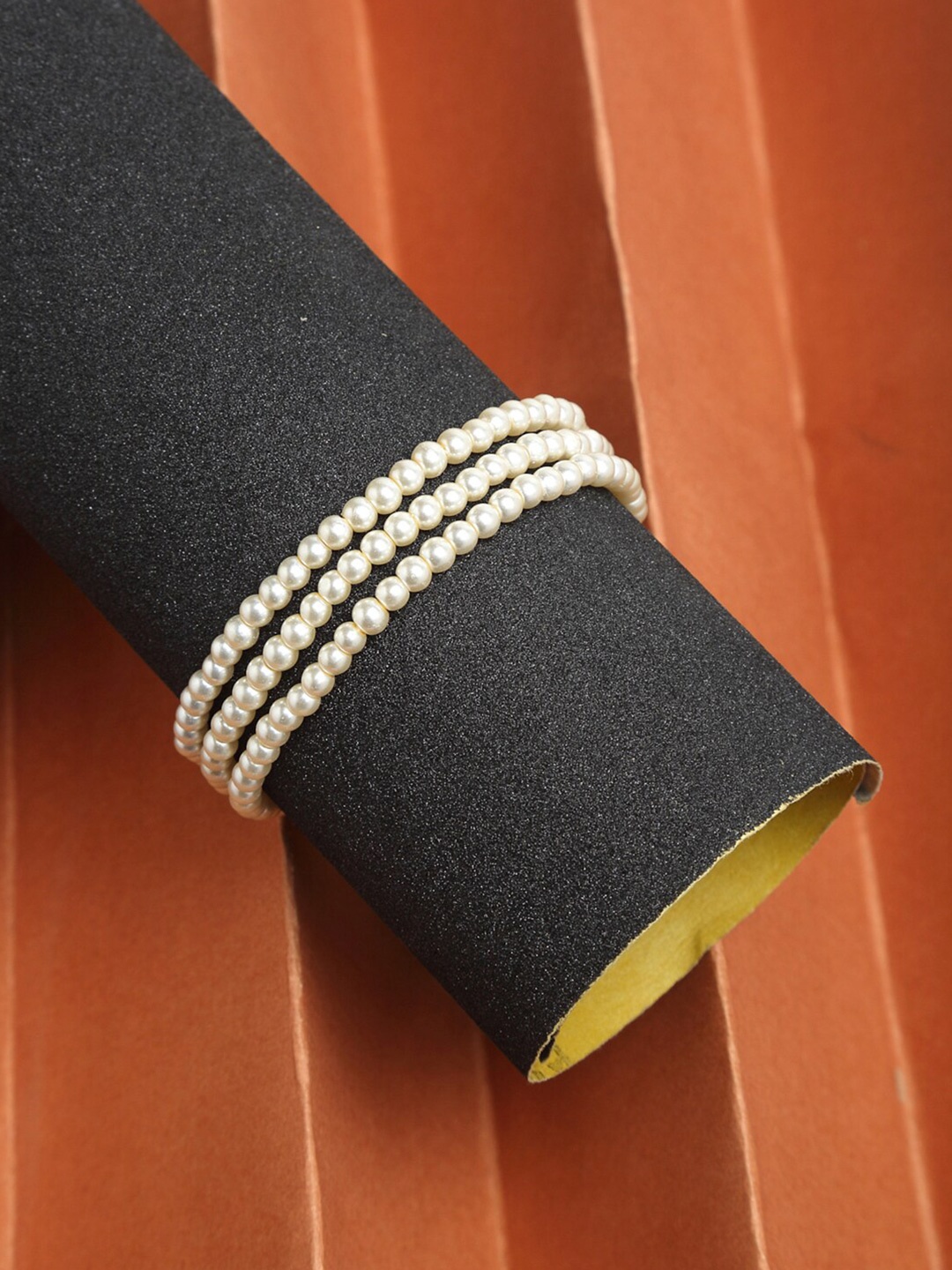 

Ruby Raang Women Gold-Toned & White Pearls Gold-Plated Multi-strand Bracelet