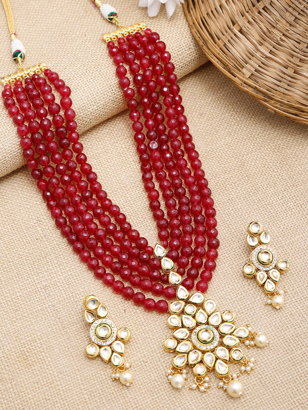 

Ruby Raang Gold-Plated Maroon Kundan Studded & Beaded Jewellery Set