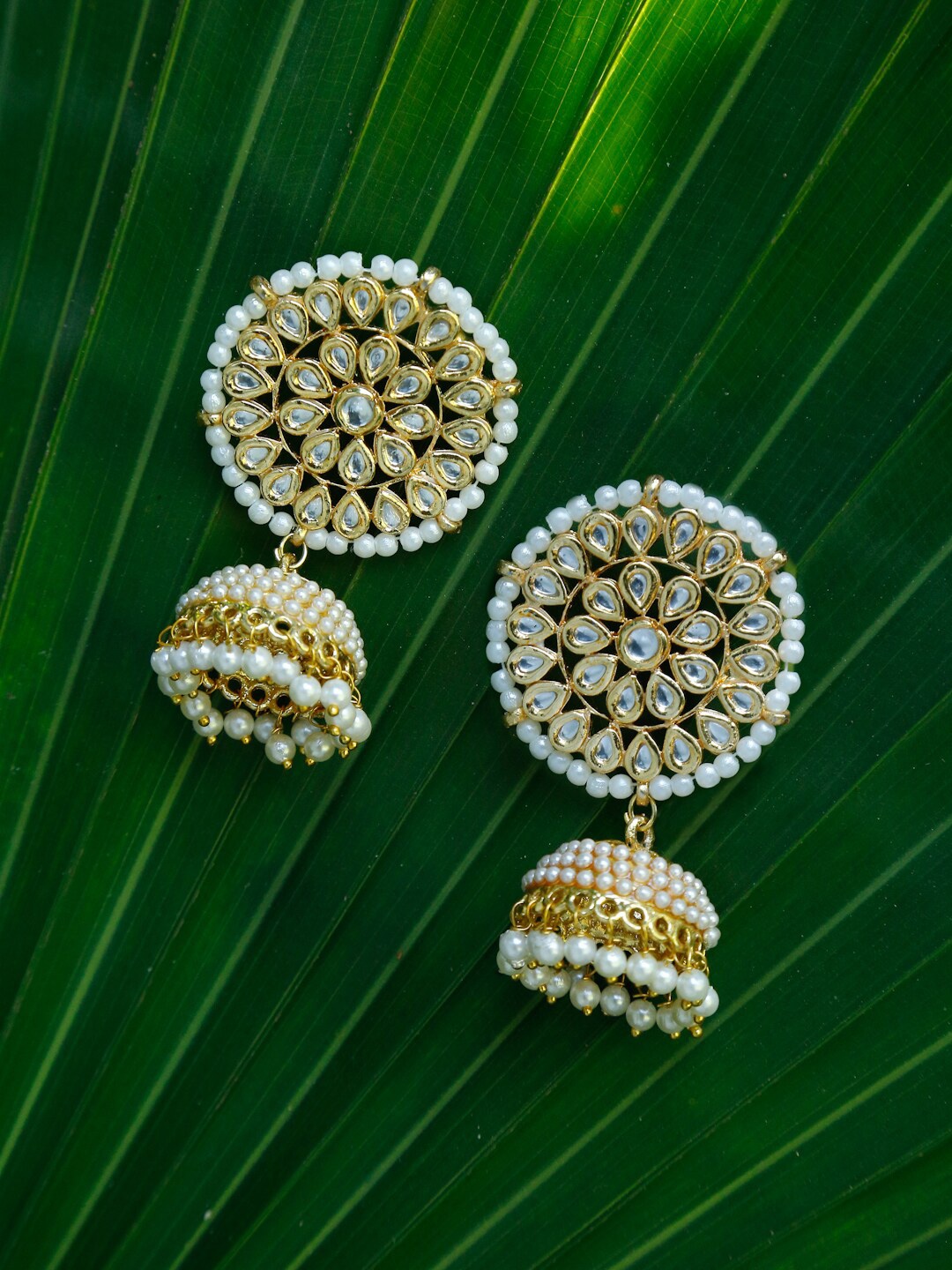 

Ruby Raang Gold & White Kundan Studded Dome Shaped Jhumka Earrings