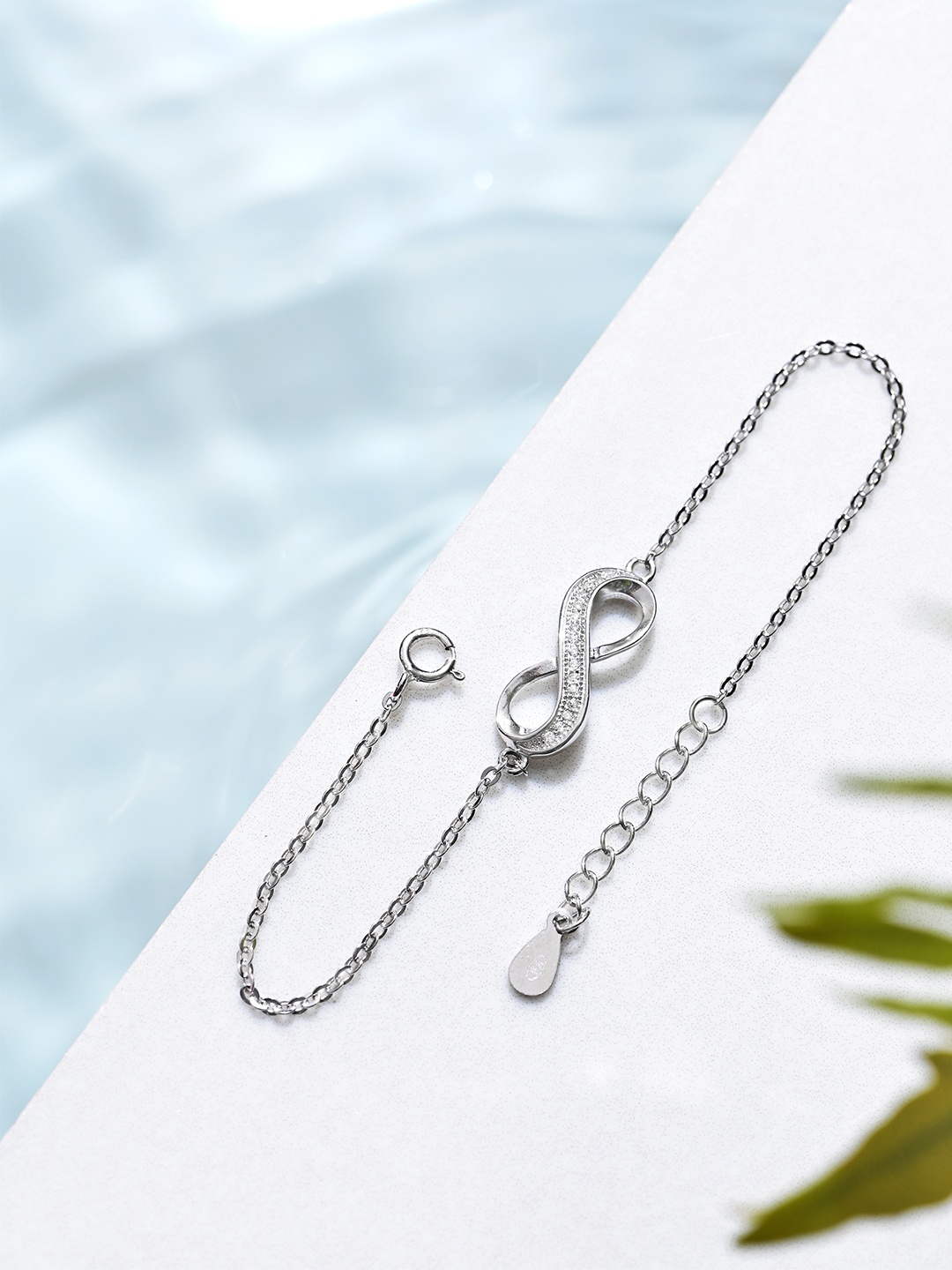 

Zavya Women 925 Sterling Silver Cubic Zirconia Rhodium-Plated Charm Bracelet