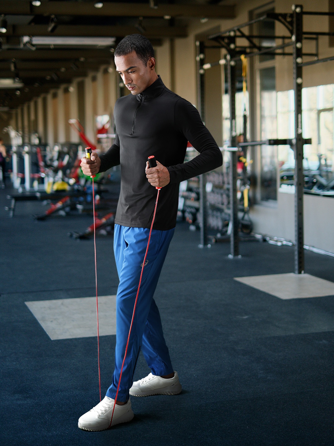 

ASICS Men Blue Solid Mid-Rise Zip Bottom Woven Running Track Pants