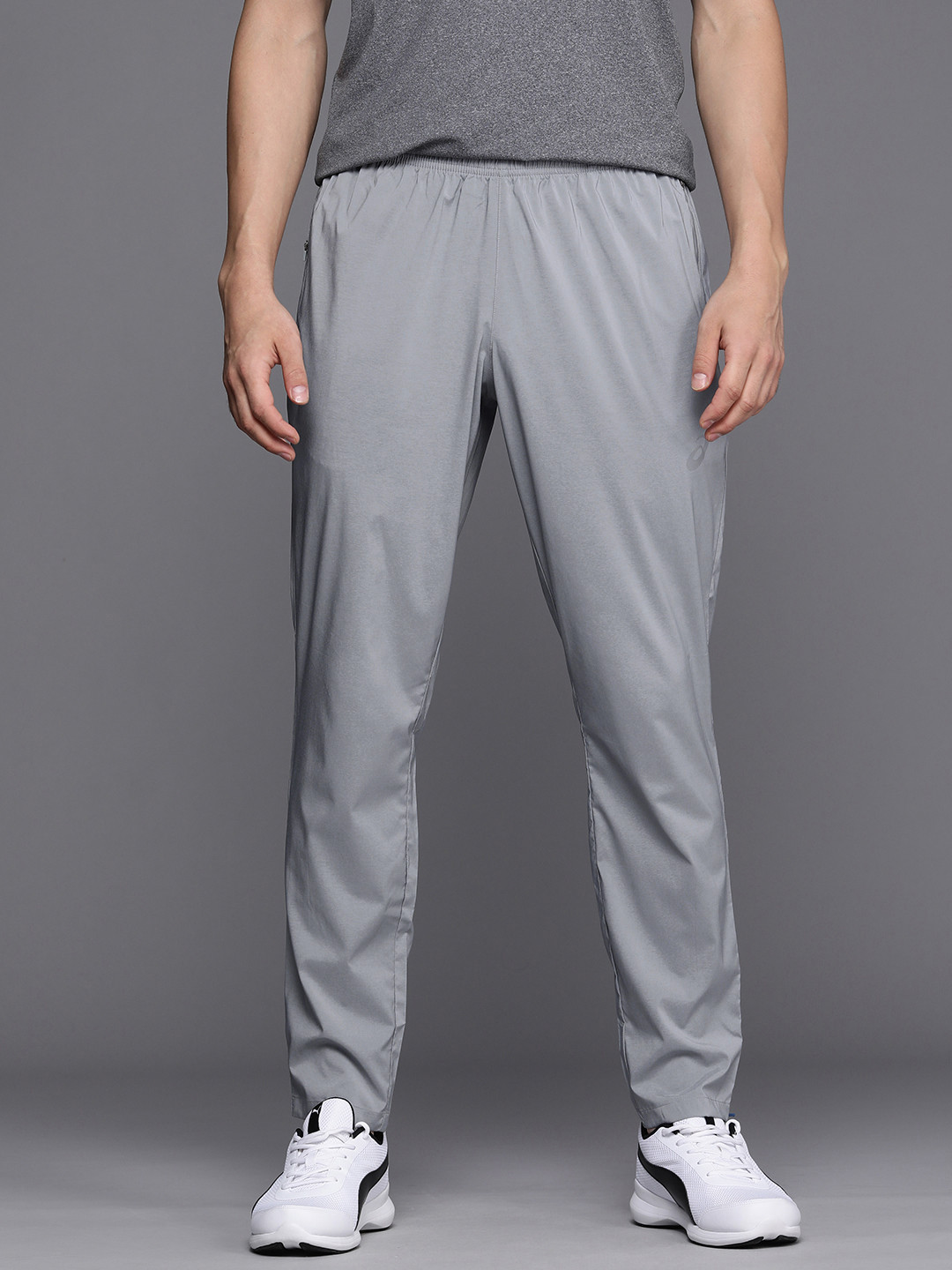 

ASICS Men Men Grey Solid Mid-Rise Zip Bottom Woven Running Track Pants