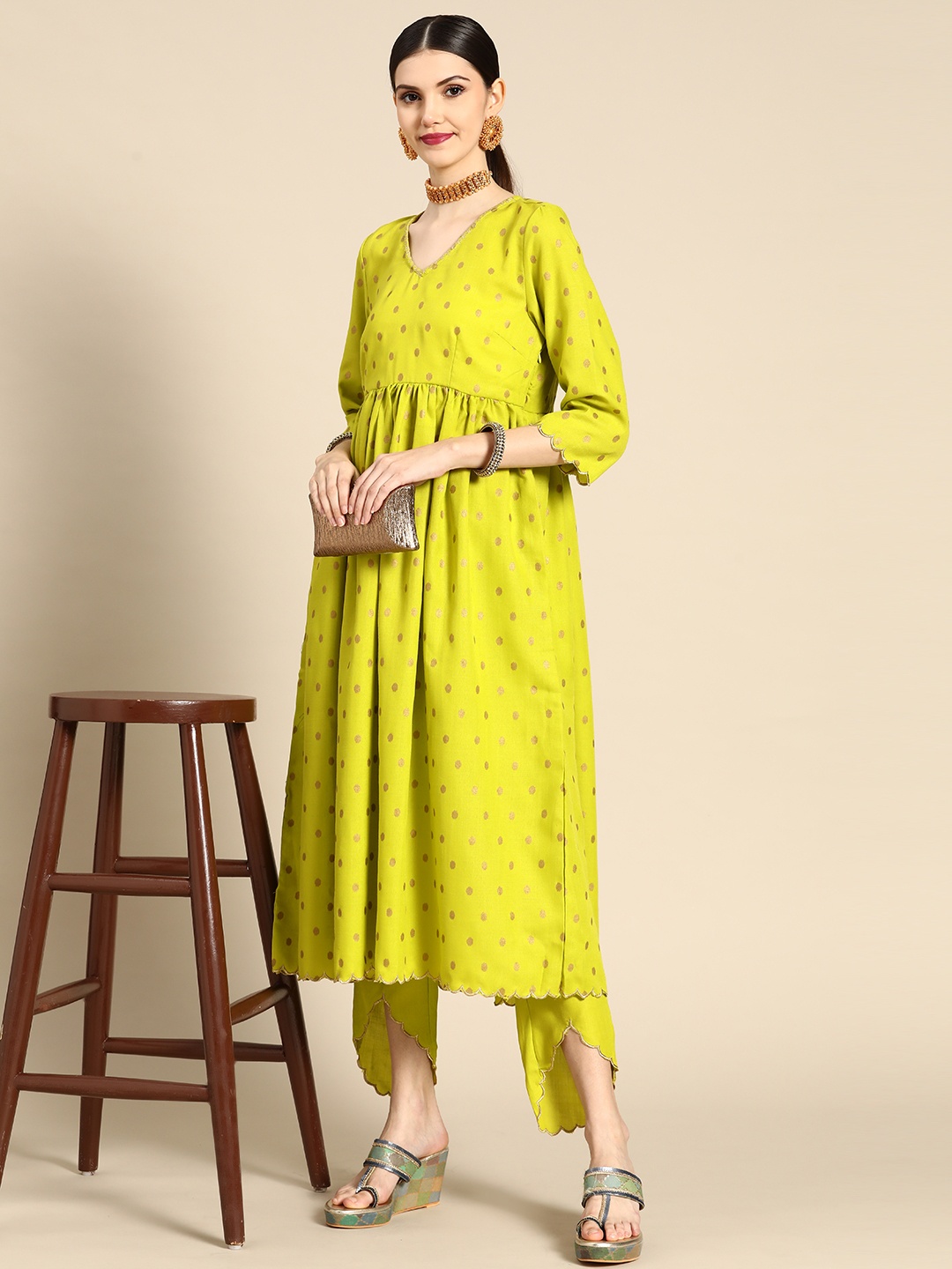 

Anouk Women Lime Green Printed Empire Thread Work Kurta with Trousers