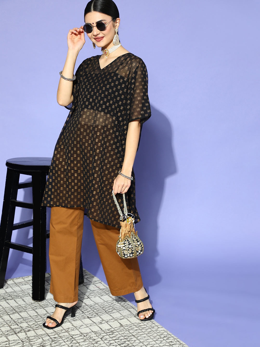 

Anouk Stylish Black Polyester New Age Kaftan Kurta