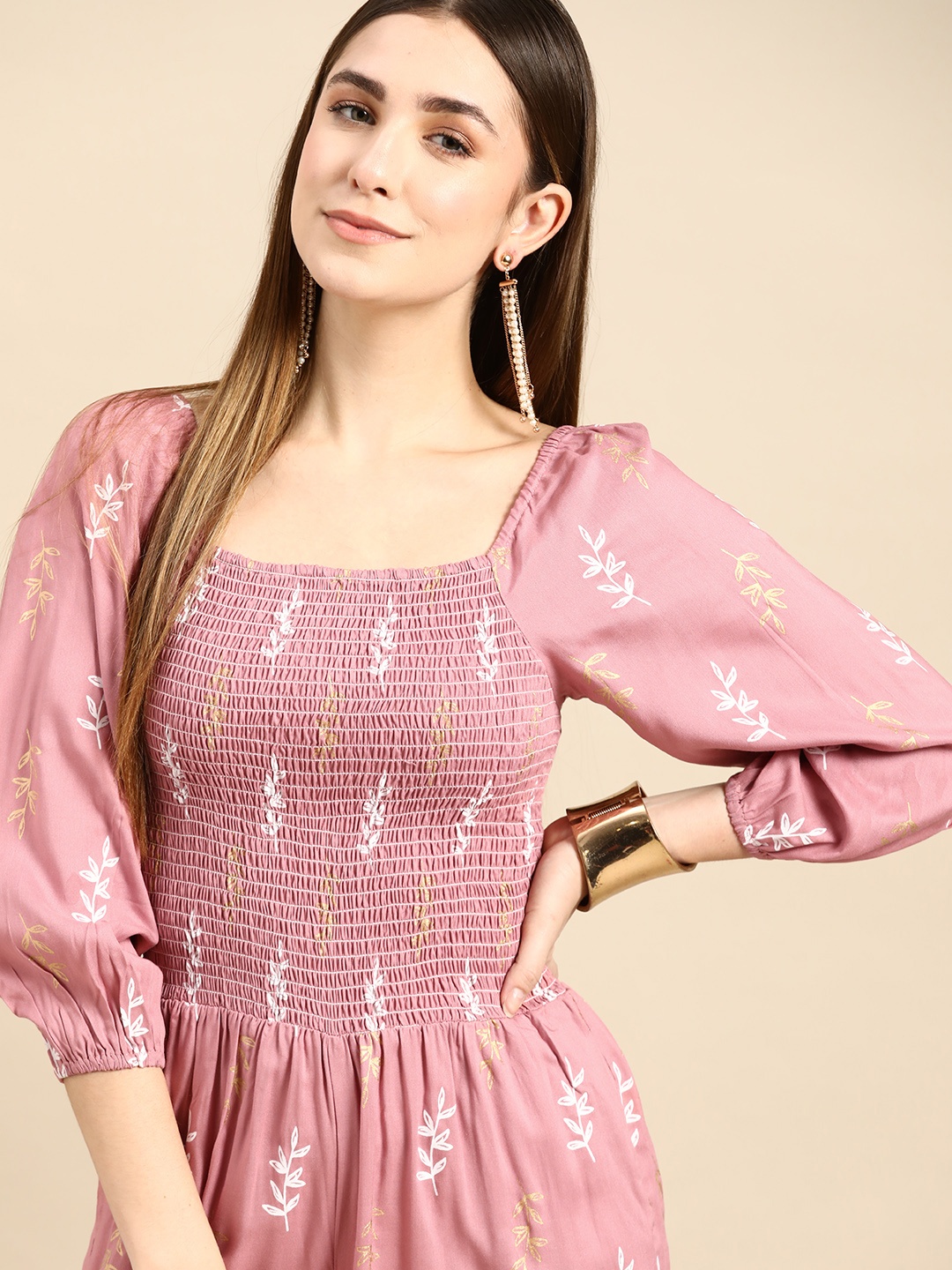 

Anouk Women Mauve & White Floral Printed Smocked Basic Jumpsuit