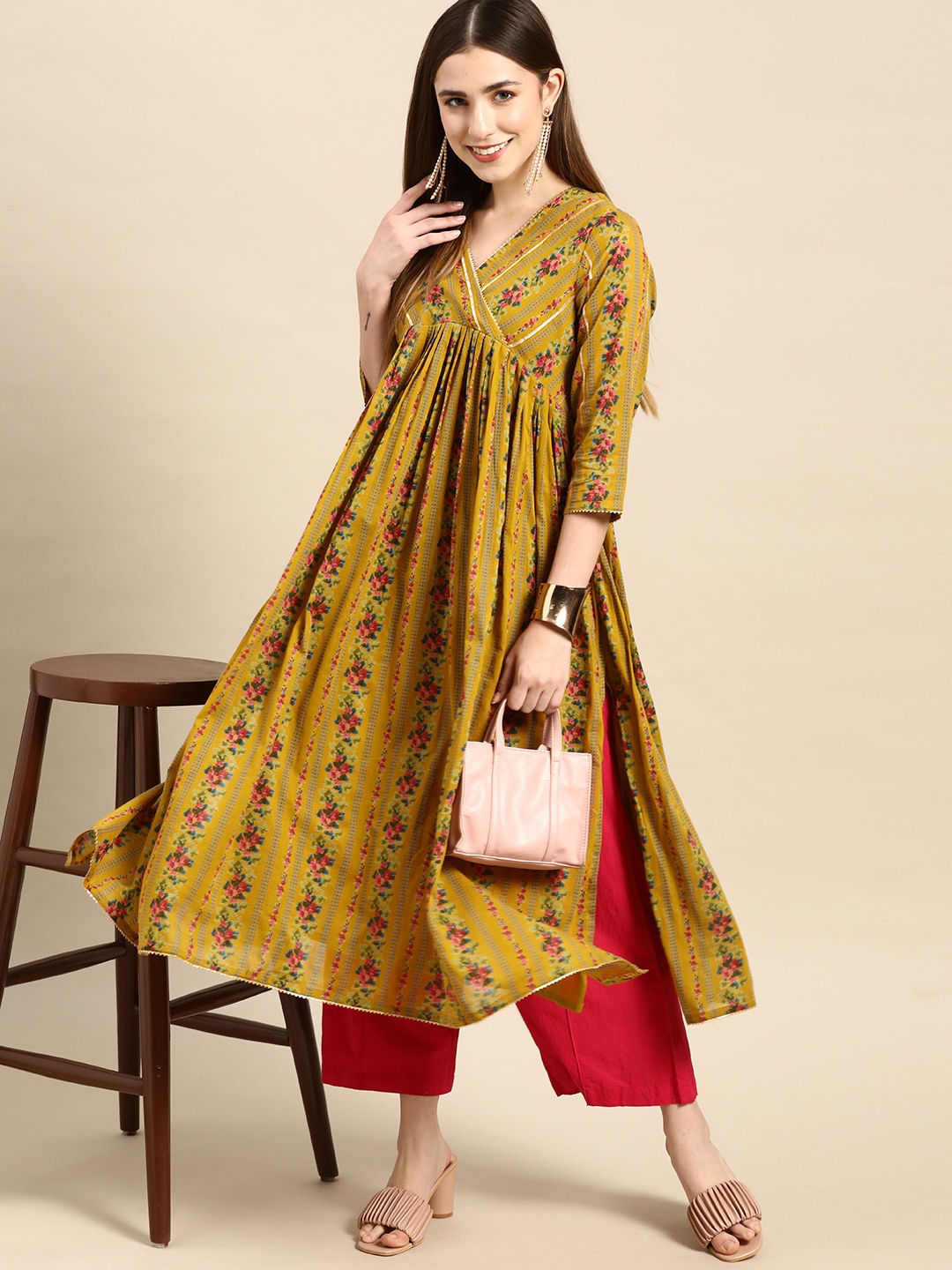 

Anouk Women Mustard Yellow & Pink Pure Cotton Floral Printed Gotta Patti Floral Kurta