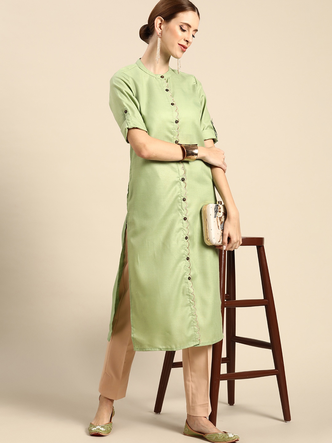 

Anouk Women Green Solid Thread Work Detail Kurta