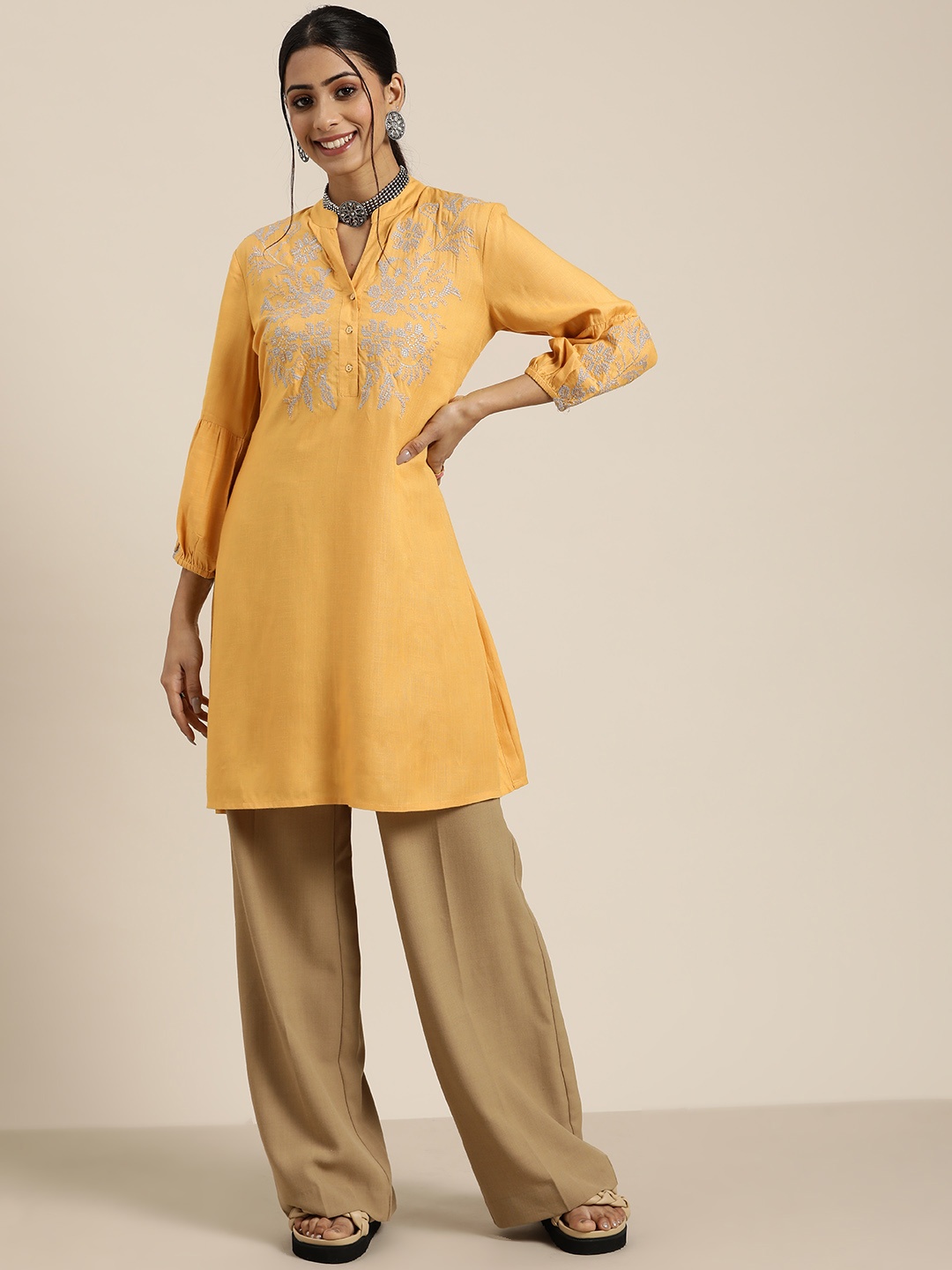 

Sangria Women Peach-Coloured Ethnic Motifs Embroidered A-Line Kurta