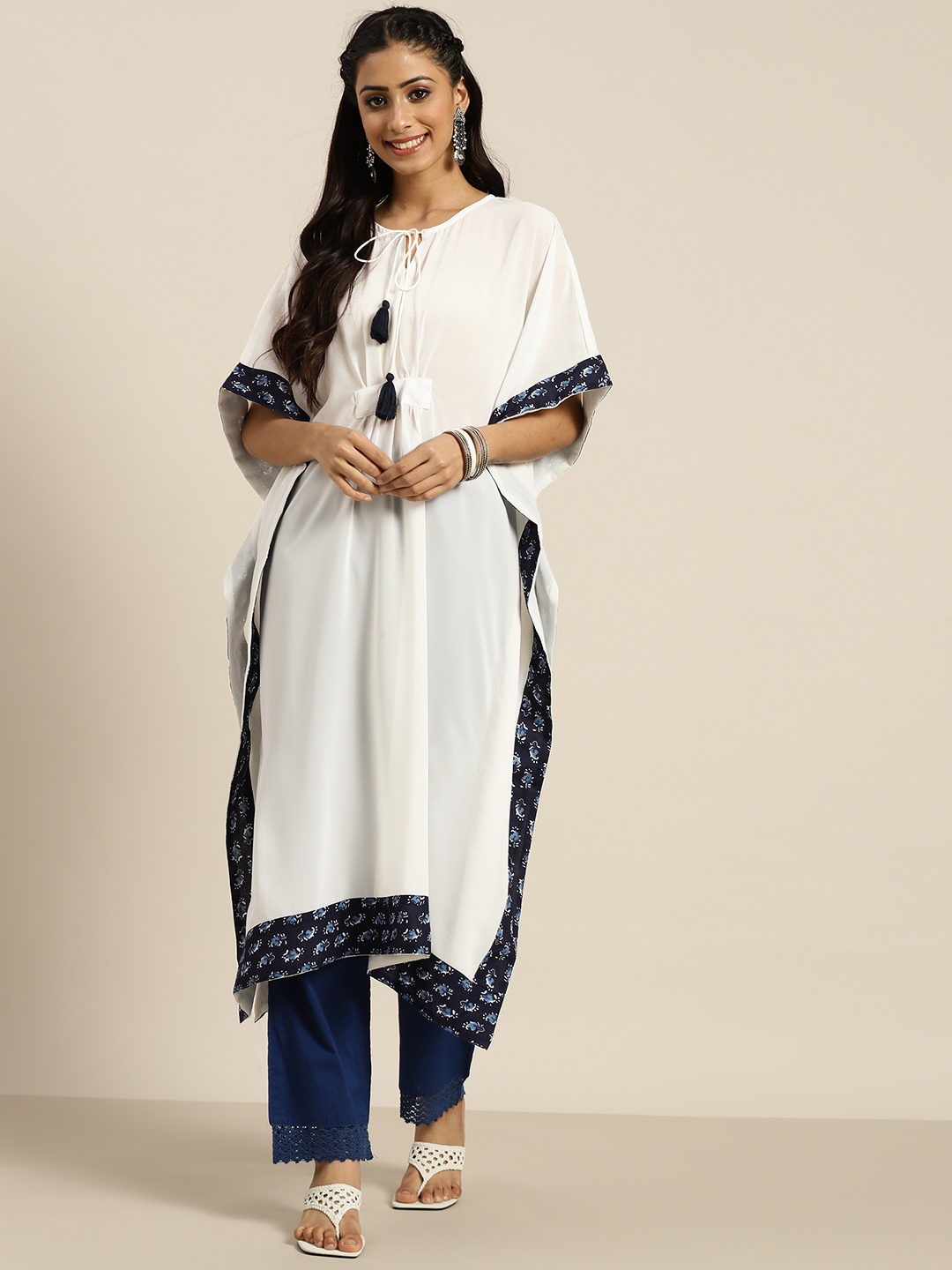

Sangria White Extended Sleeves Kaftan Kurti