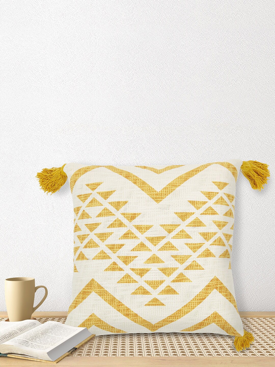 

Living scapes by Pantaloons Yellow & White Geometric Tasseled Square Cushion Covers