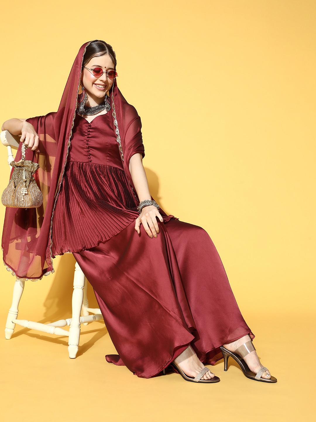 

Inddus Solid Silk Blend Swirling Volume Kurta Set, Maroon