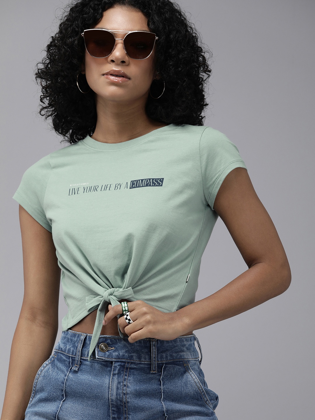 

Roadster Women Green & Navy Blue Typography Printed Cropped T-shirt With Tie-Up Detail