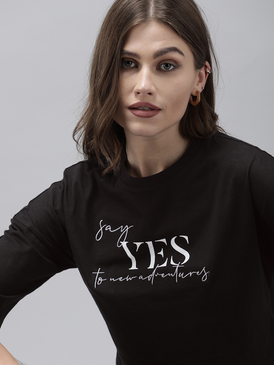 

The Roadster Lifestyle Co Women Black Typography Printed Extended Sleeves Pure Cotton Crop T-shirt
