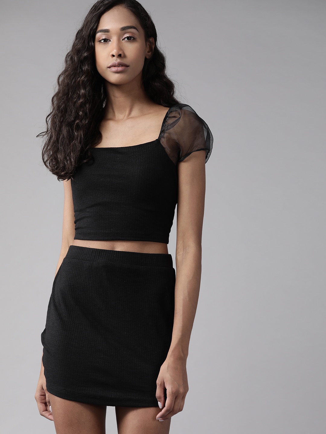 

Roadster Women Stylish Black Solid Top with Skirt