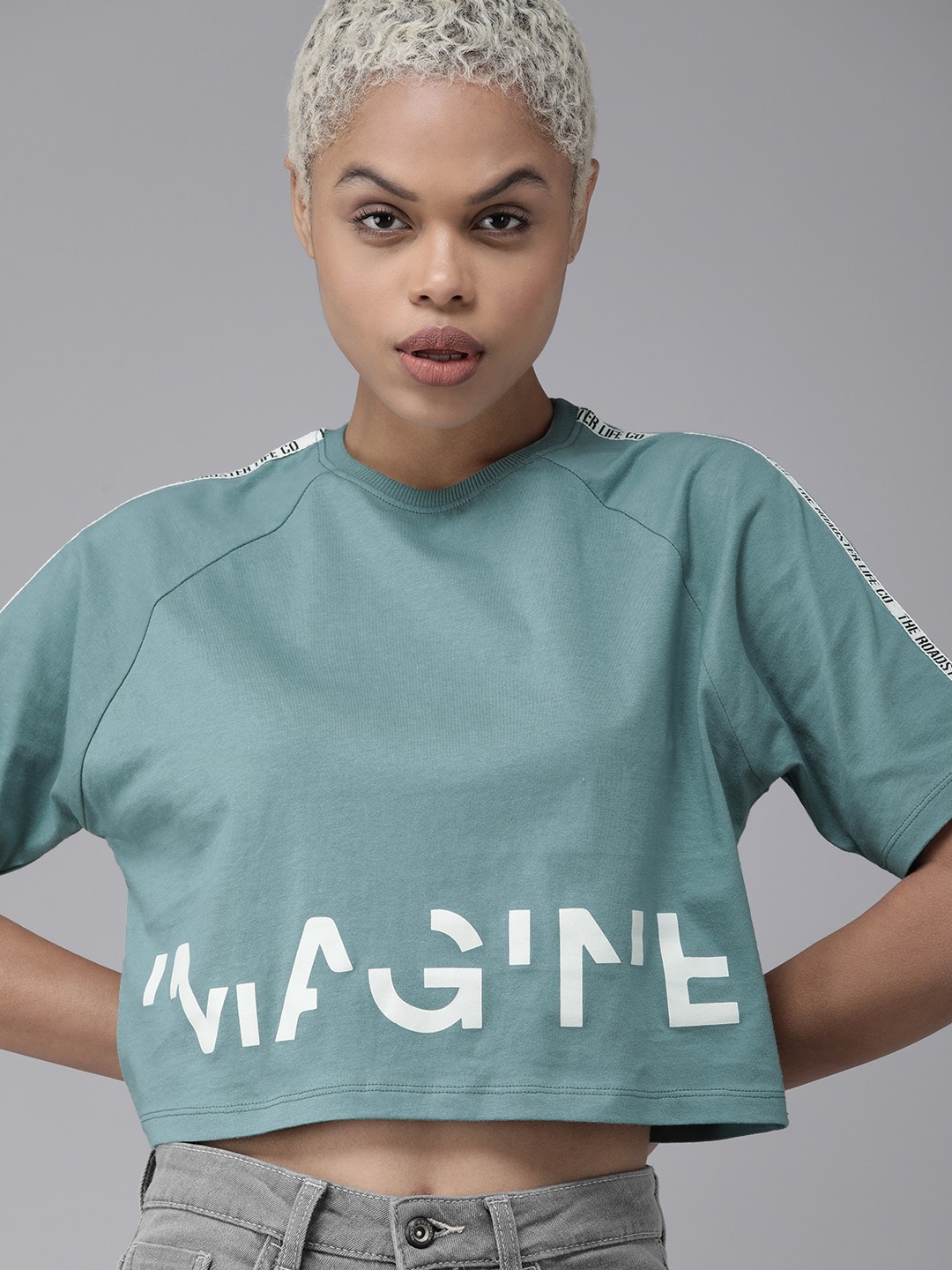 

The Roadster Lifestyle Co Women Blue & White Typography Printed Pure Cotton Cropped T-shirt