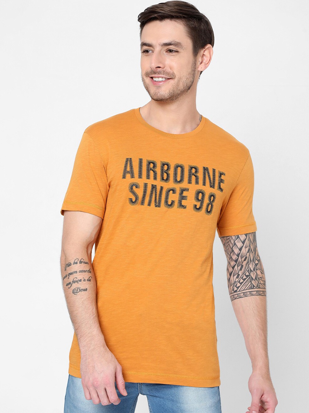 

Mufti Men Mustard Yellow & Black Typography Printed Slim Fit Cotton T-shirt