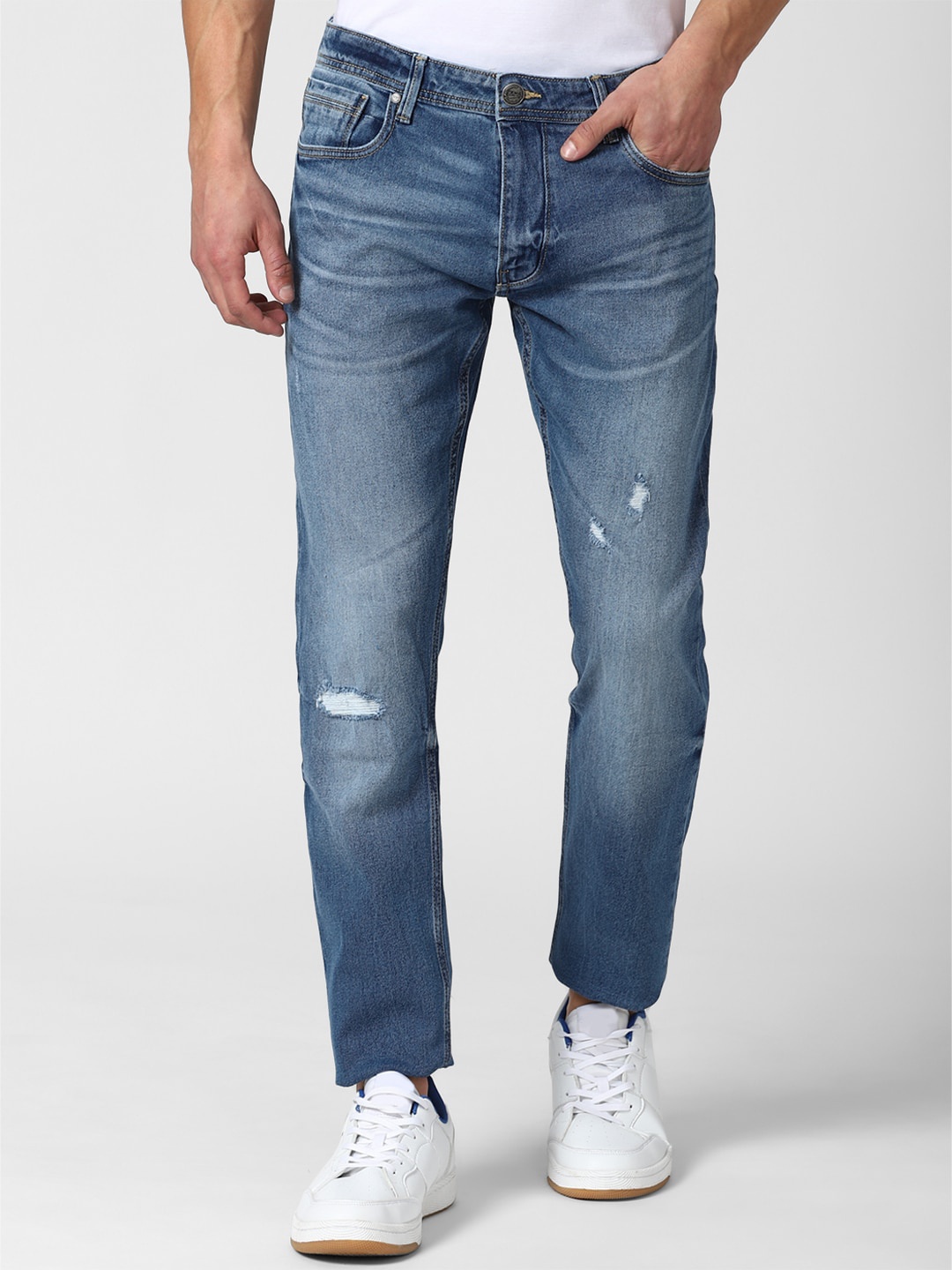 

Peter England Casuals Men Blue Low Distress Heavy Fade Regular Fit Jeans