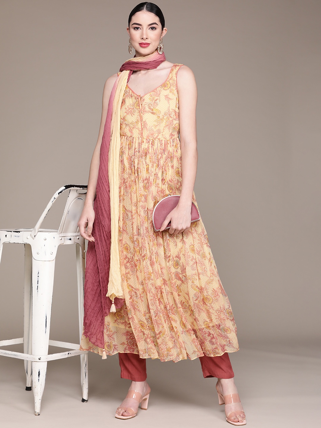 

aarke Ritu Kumar Women Yellow Floral Printed Kurta with Trousers & Dupatta