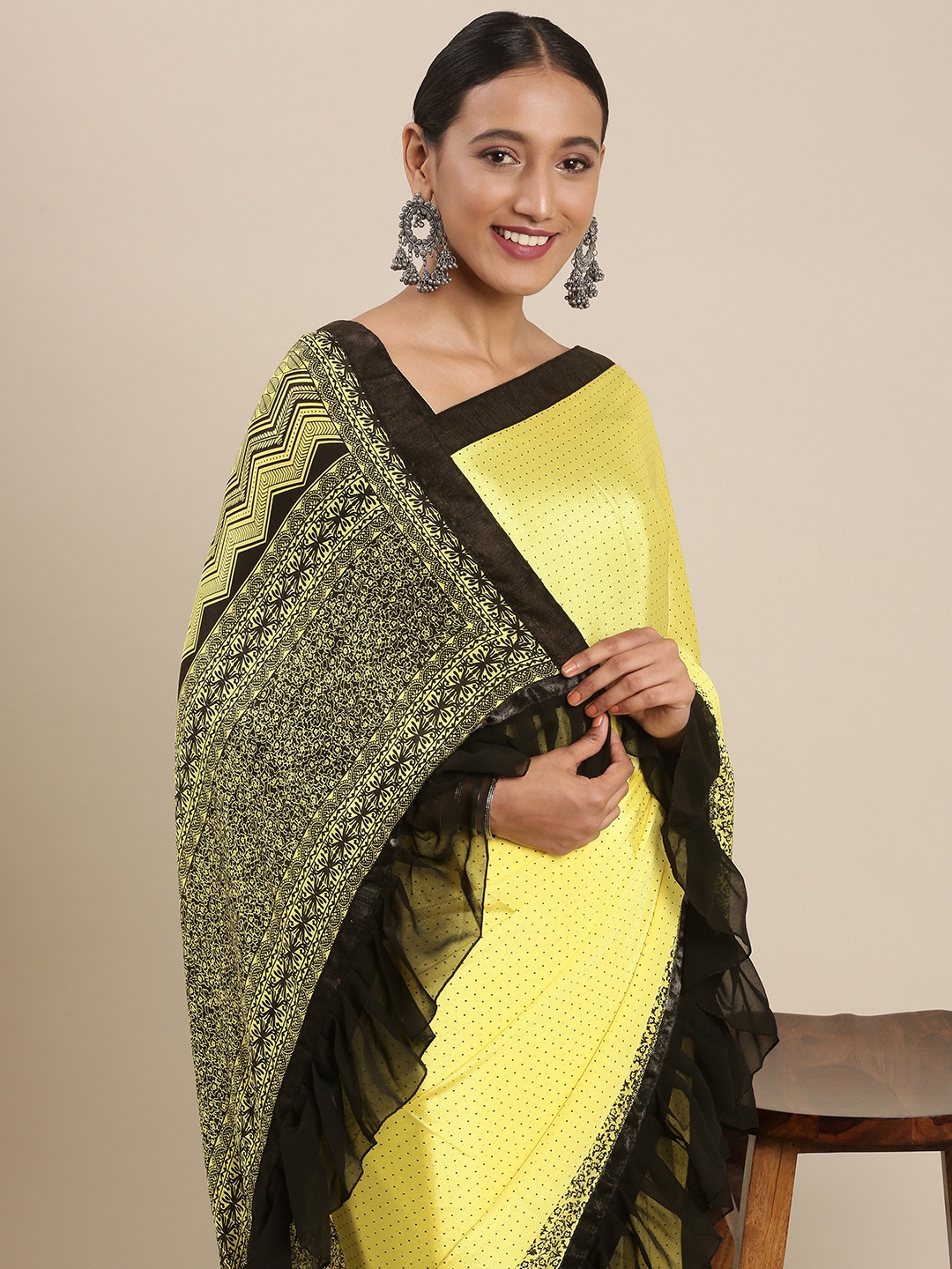 

Mitera Yellow & Black Printed Ruffle Saree