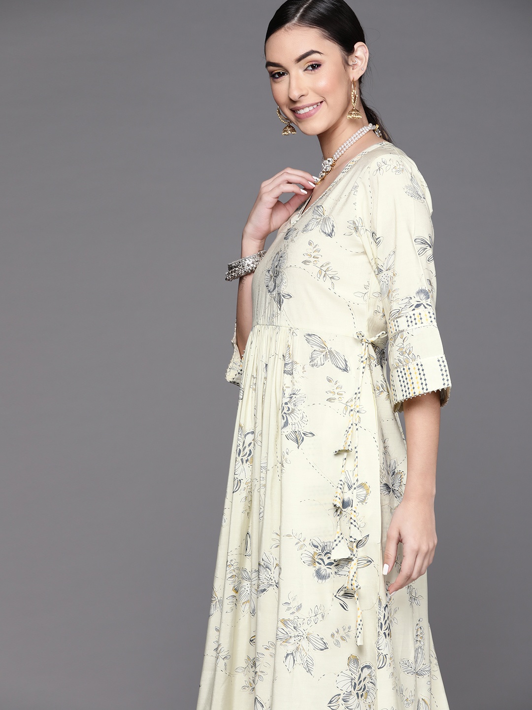 

Libas Women Yellow Floral Printed Flared Sleeves Gotta Patti Floral Anarkali Kurta