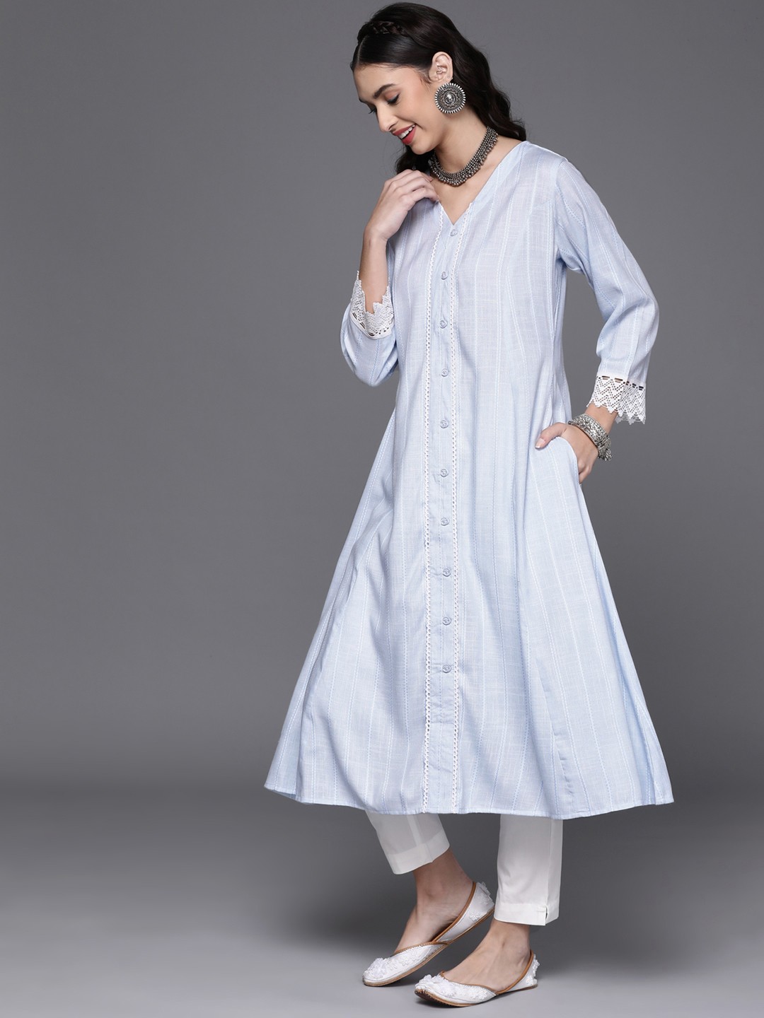 

Libas Women Blue Striped A-line With One Side Pocket Kurta