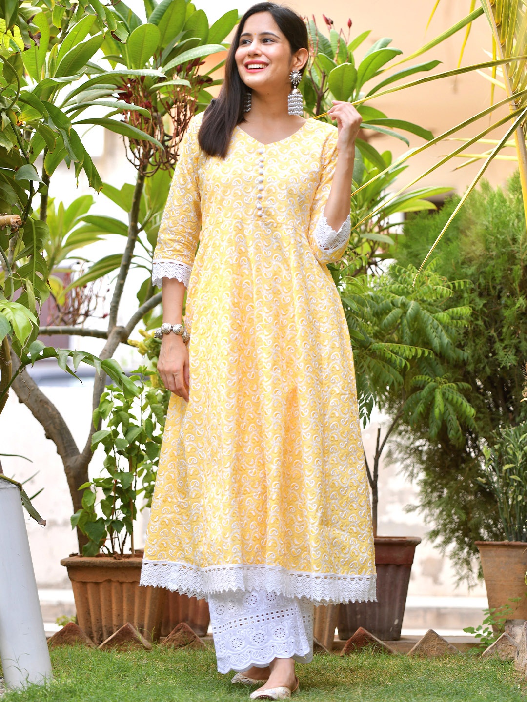 

Libas Women Yellow Paisley Embroidered Chikankari Cotton A-line Kurta