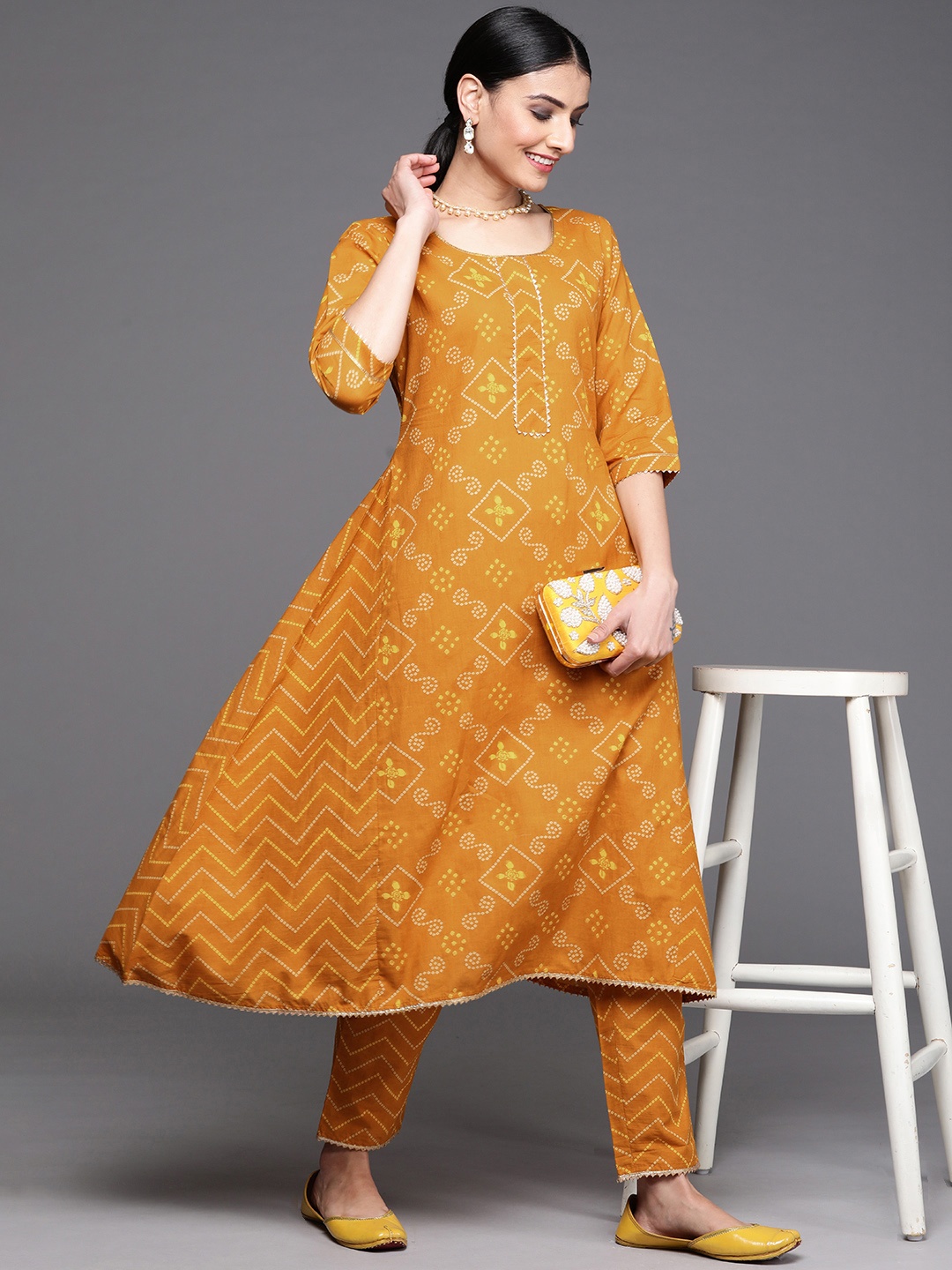 

Libas Women Mustard Yellow Bandhani Print Round Neck Gotta Patti Pure Cotton A-Line Kurta