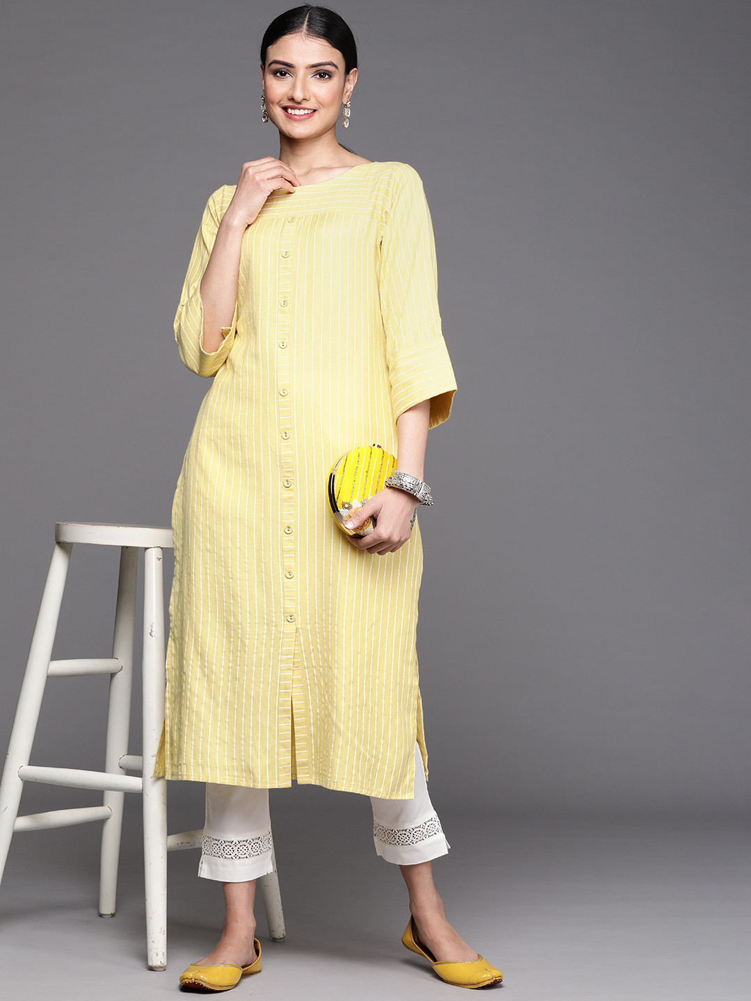 

Libas Women Yellow Striped Flared Sleeves Kurta
