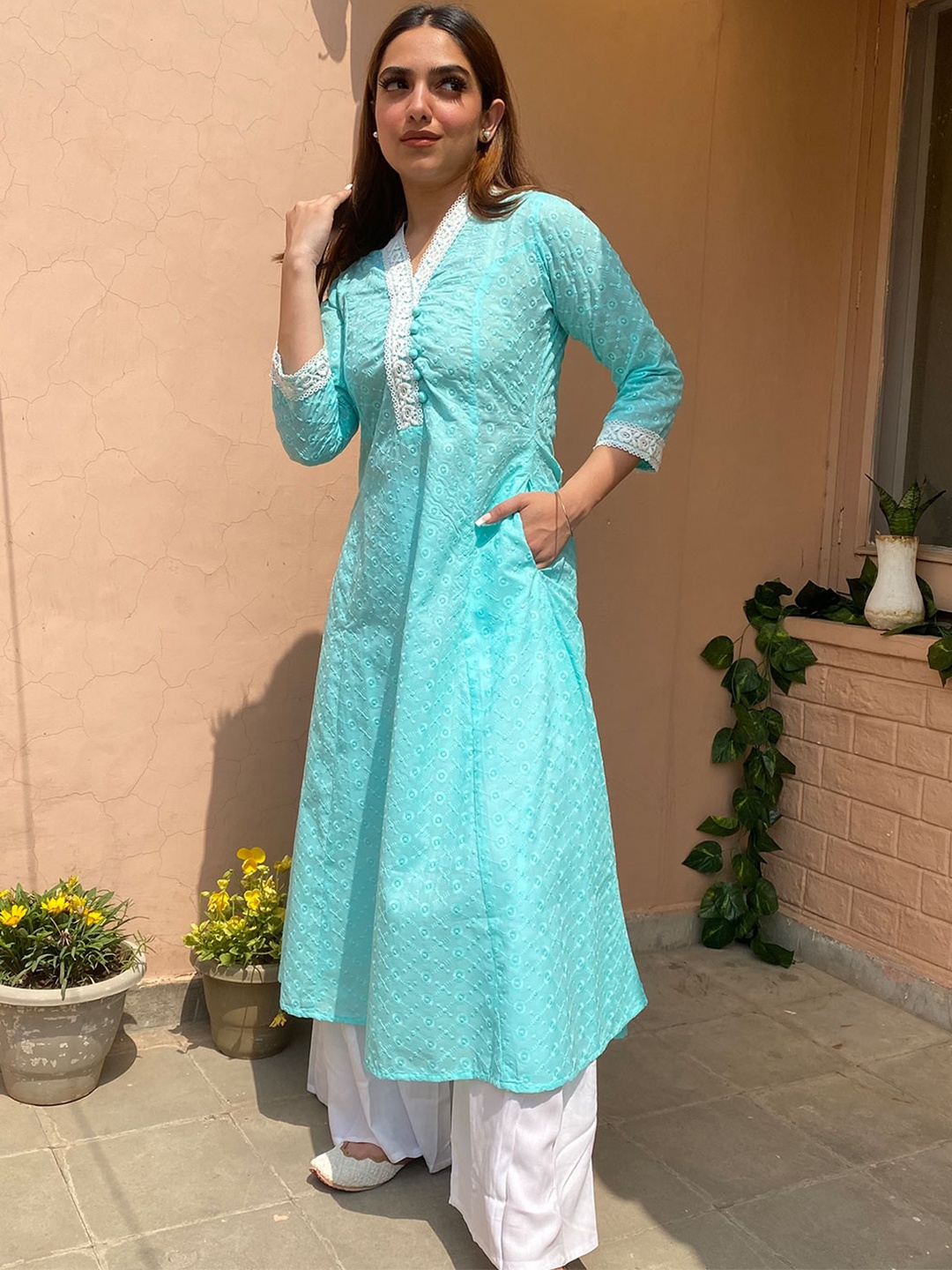 

Libas Women Turquoise Blue Chikankari Cotton A-line Kurta