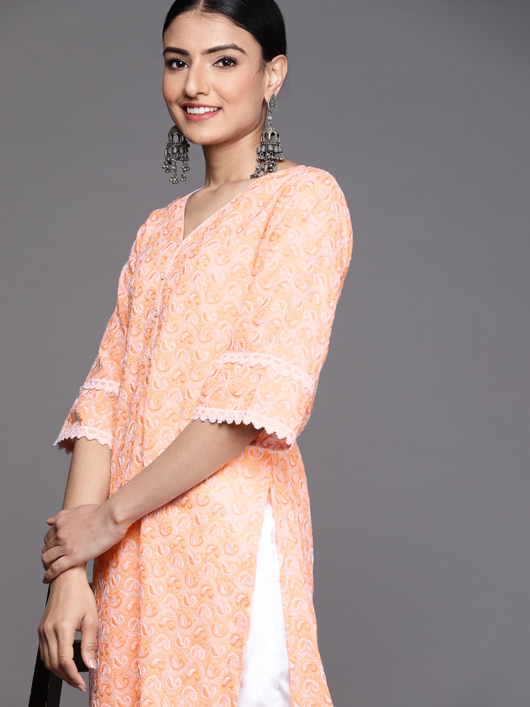 

Libas Women Orange Paisley Embroidered Chikankari Cotton Kurta