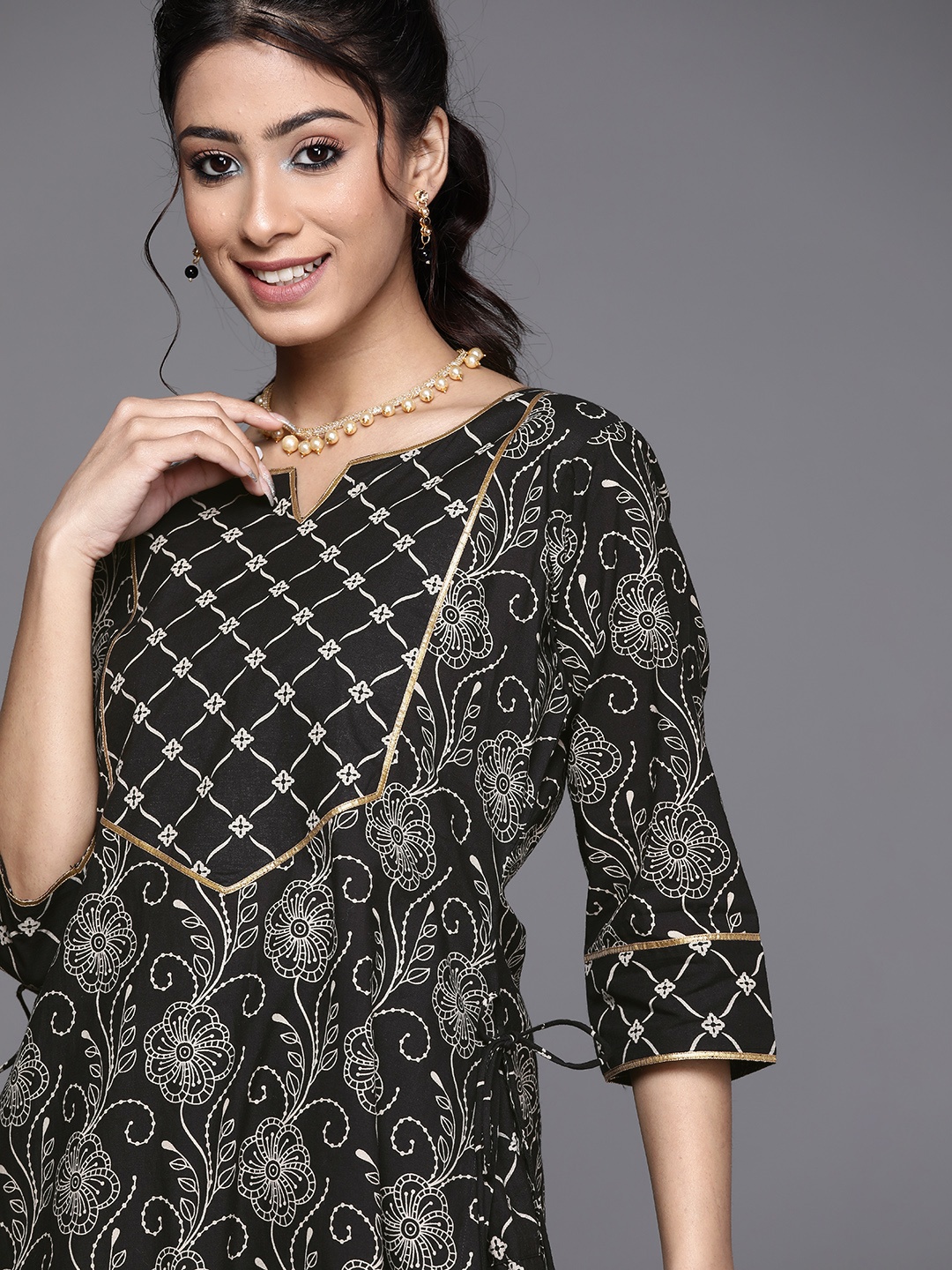 

Libas Women Black & White Pure Cotton Ethnic Motifs Printed Gotta Patti Kurta